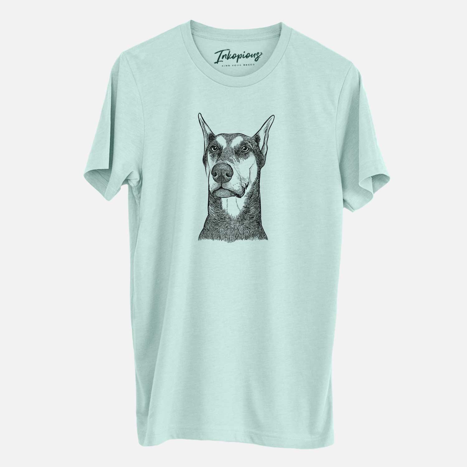 Hand-drawn sketch of Zeus the Doberman Pinscher on a Heather Sage Unisex crewneck