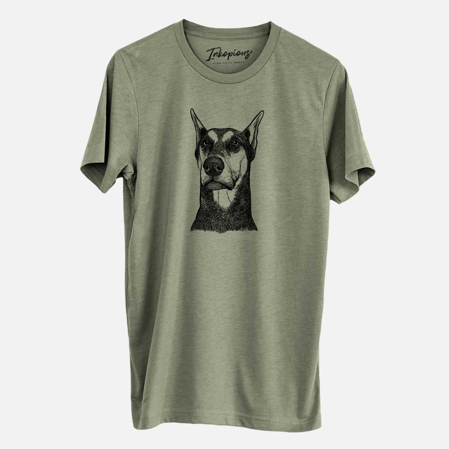 Hand-drawn sketch of Zeus the Doberman Pinscher on an Olive Unisex crewneck