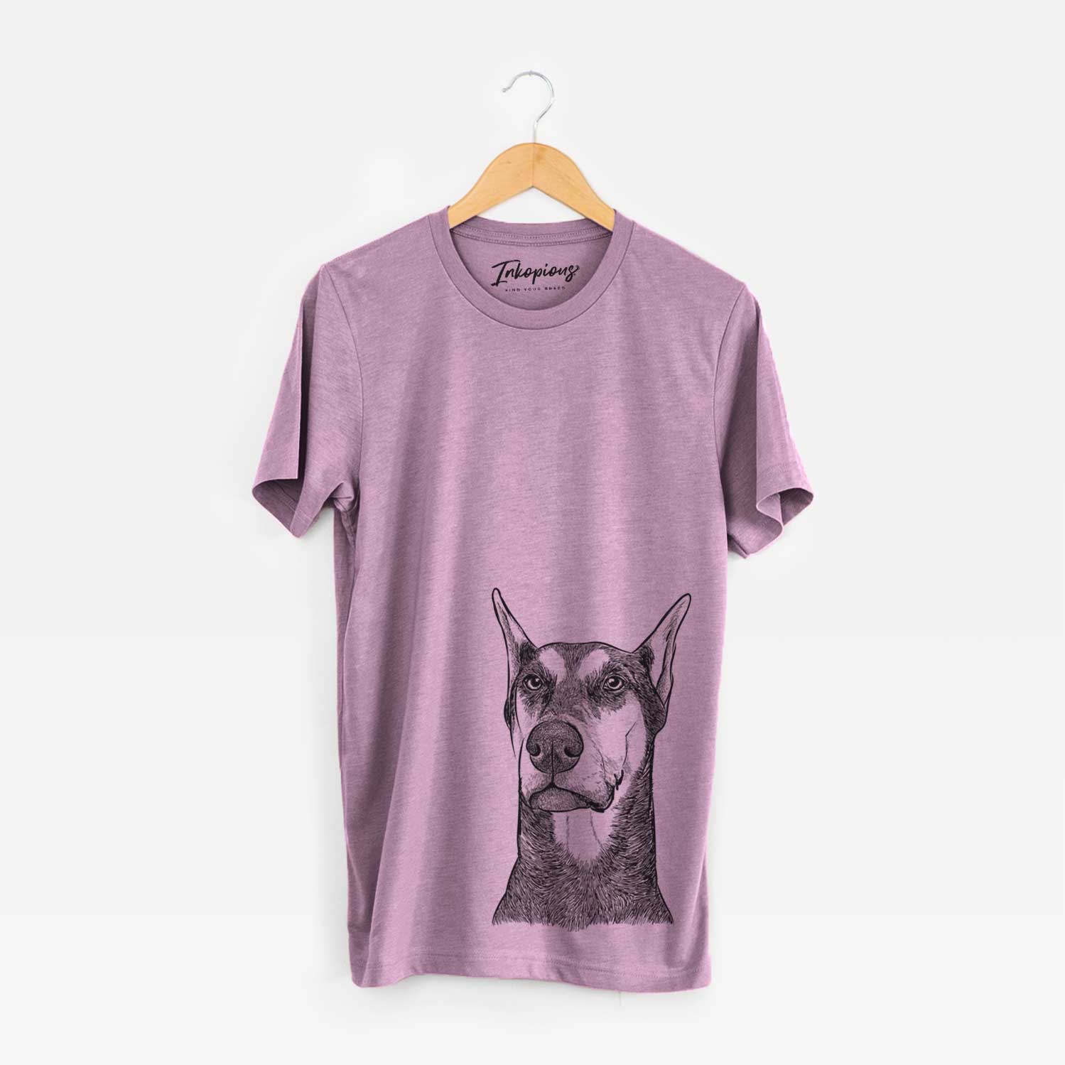 Hand-drawn sketch of Zeus the Doberman Pinscher on an Orchid Unisex crewneck