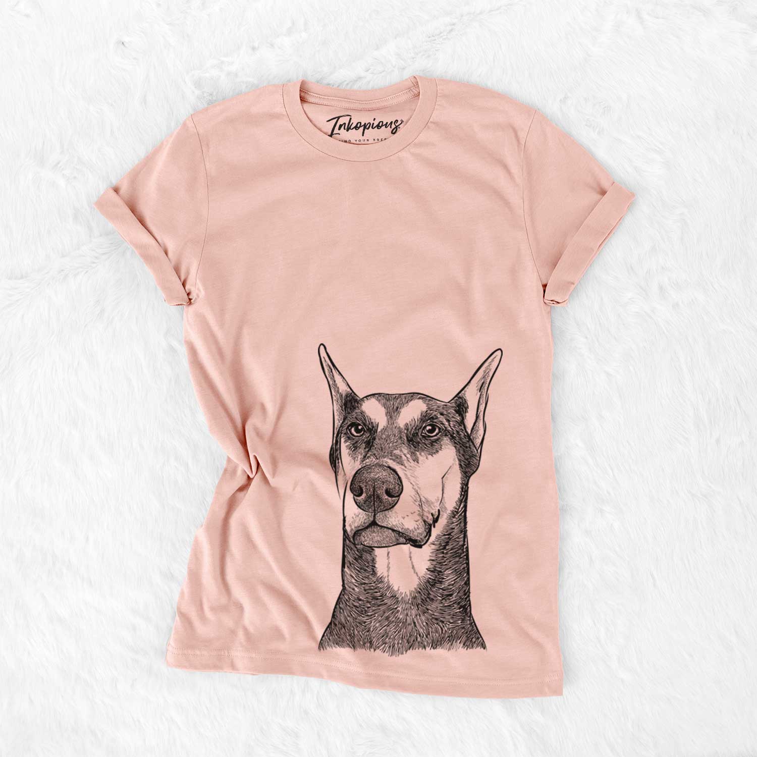 Hand-drawn sketch of Zeus the Doberman Pinscher on a Peach Bella Canvas Unisex Crewneck