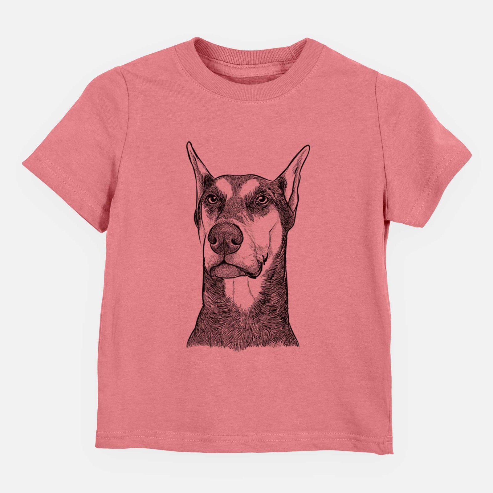 Hand-drawn sketch of Zeus the Doberman Pinscher on a Mauve kids' shirt