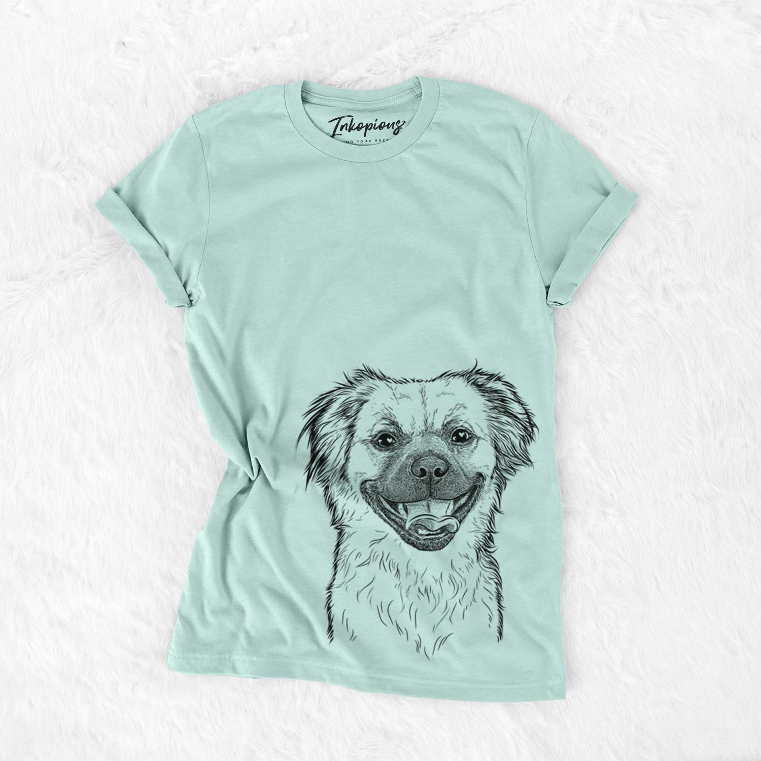 Hand-drawn sketch of Zuri the Spaniel Mix on a Heather Sage Unisex crewneck