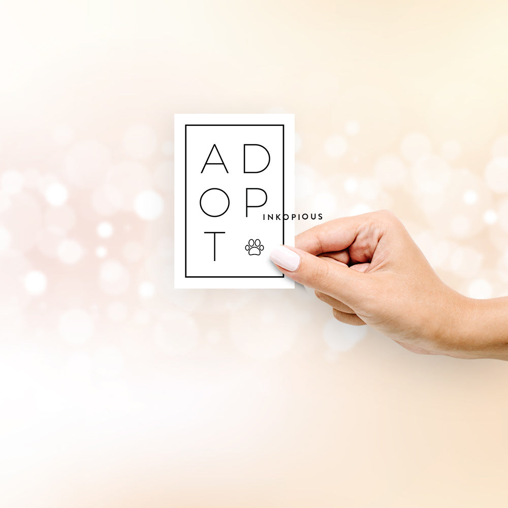 'Adopt Boxed' design on an Adopt Box Paw decal sticker