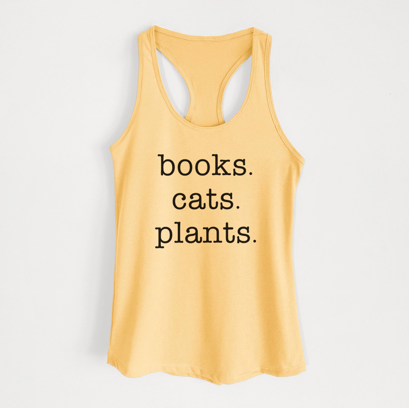 'books. cats. plants' design on a Banana Cream Women's racerback tanktop