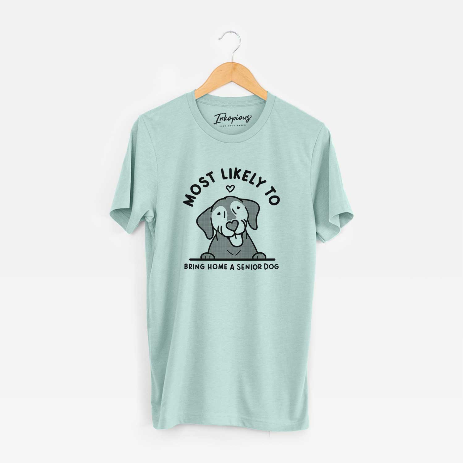 'Most Likely to Bring Home a Senior Dog' design on a Heather Sage Unisex crewneck