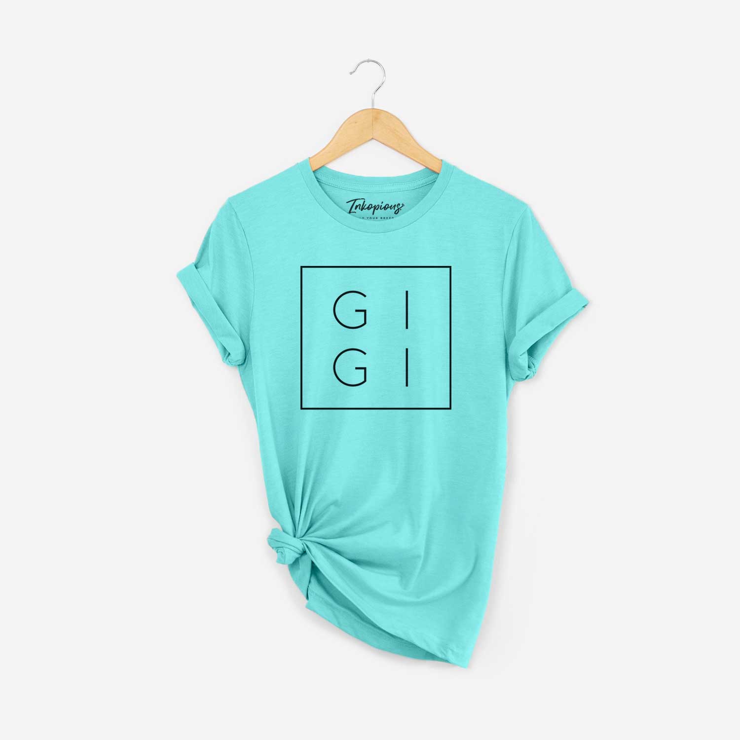 'GiGi Boxed' design on a Sea Green Unisex crewneck