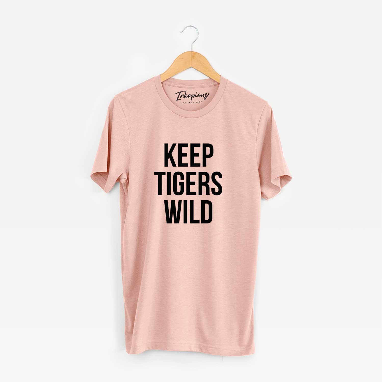 'Keep Tigers Wild' design on a Peach Unisex crewneck