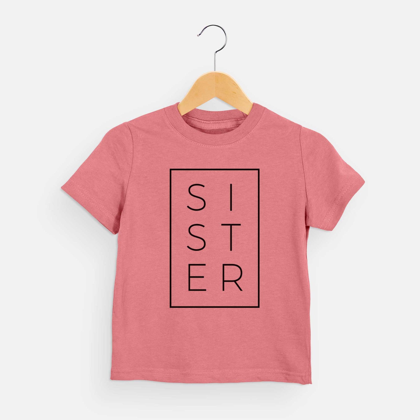 'Sister Boxed' design on a Mauve kids' shirt