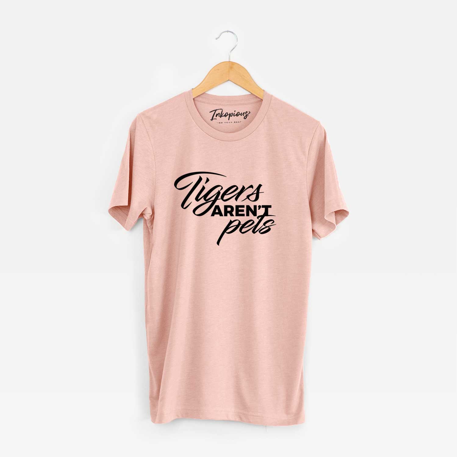 'Tigers Aren't Pets' design on a Peach Unisex crewneck