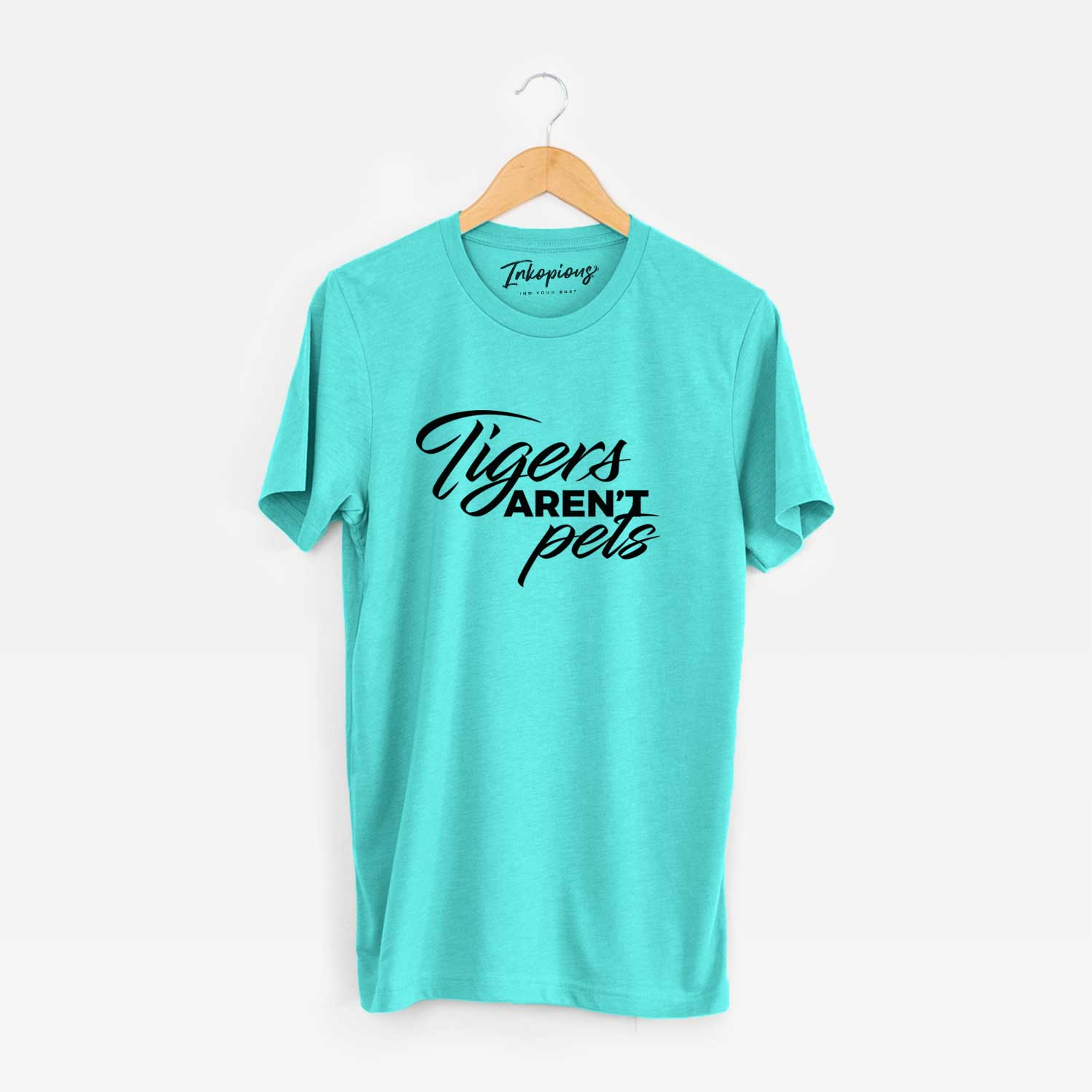 'Tigers Aren't Pets' design on a Sea Green Unisex crewneck