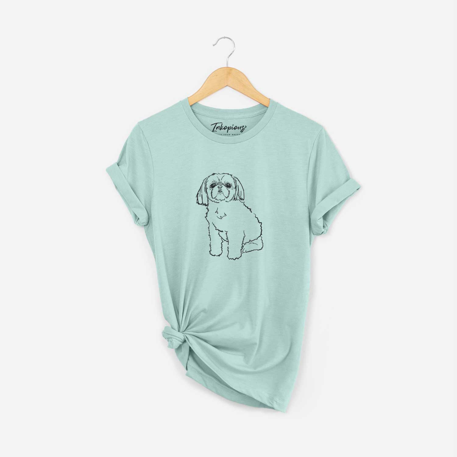 Full-body line drawing of Georgia the Shih Tzu on a Heather Sage Unisex crewneck