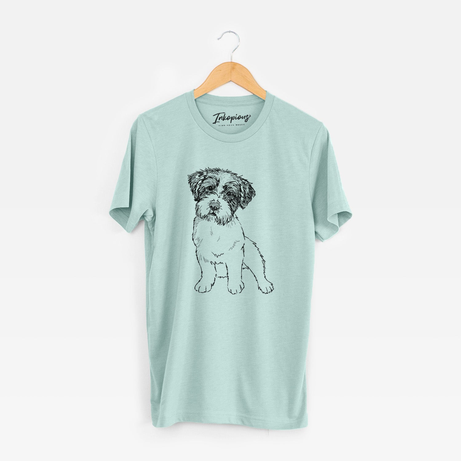 Full-body line drawing of Groot the Maltese Mix on a Heather Sage Unisex crewneck