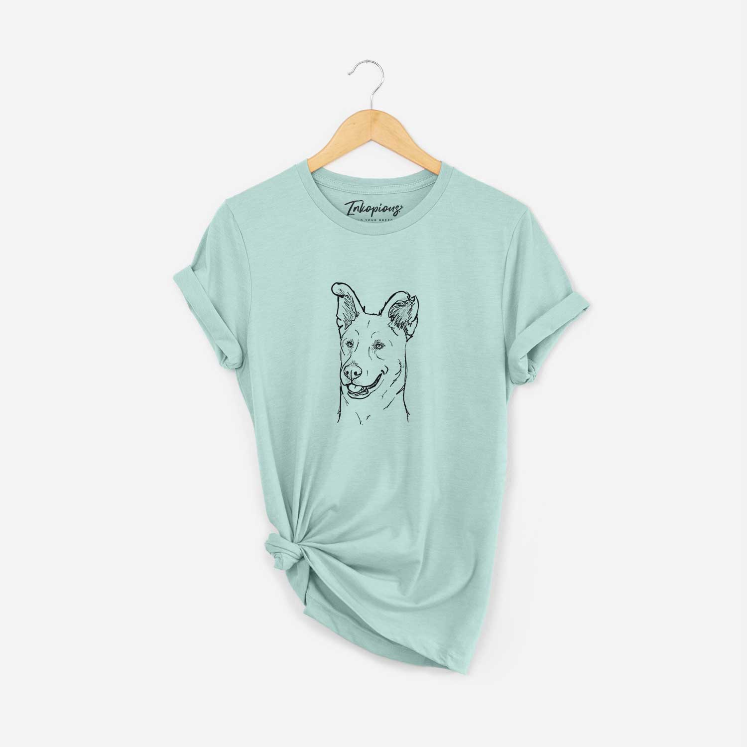 Full-body line drawing of Lola the Shepherd Mix on a Heather Sage Unisex crewneck