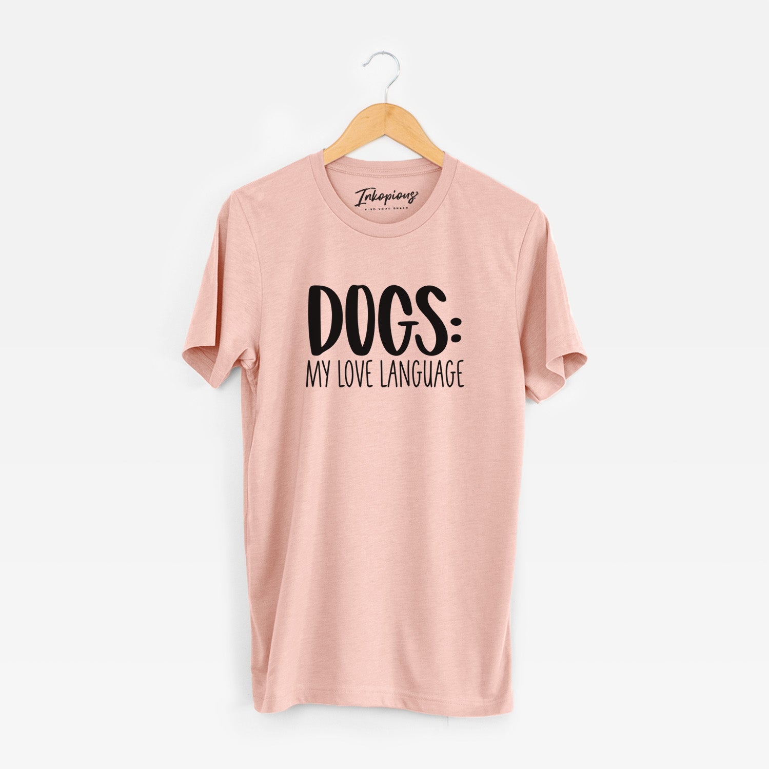 'Dogs: My Love Language' design on a Peach Unisex crewneck
