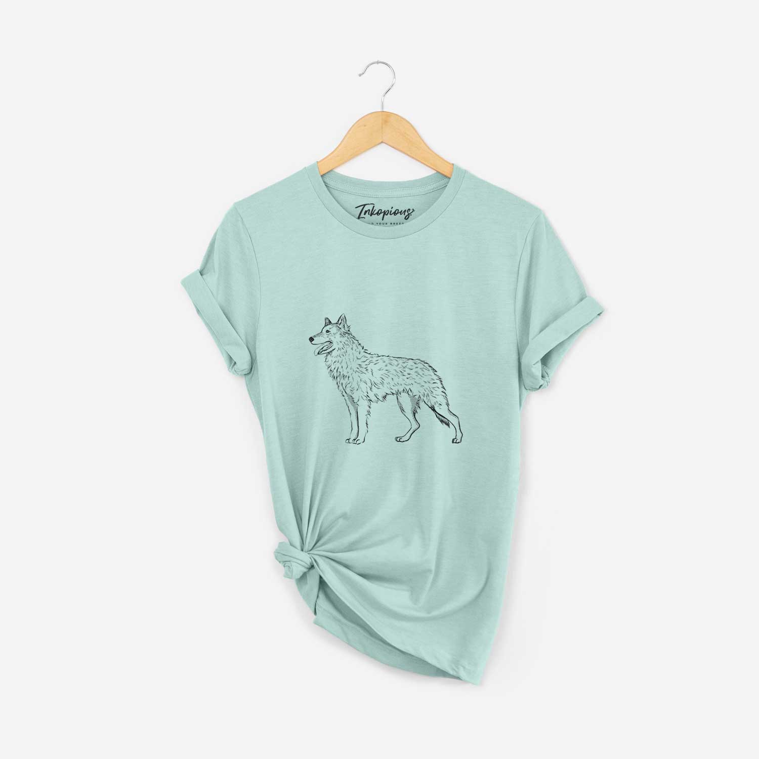 Full-body sketch of a Mudi on a Heather Sage Unisex crewneck