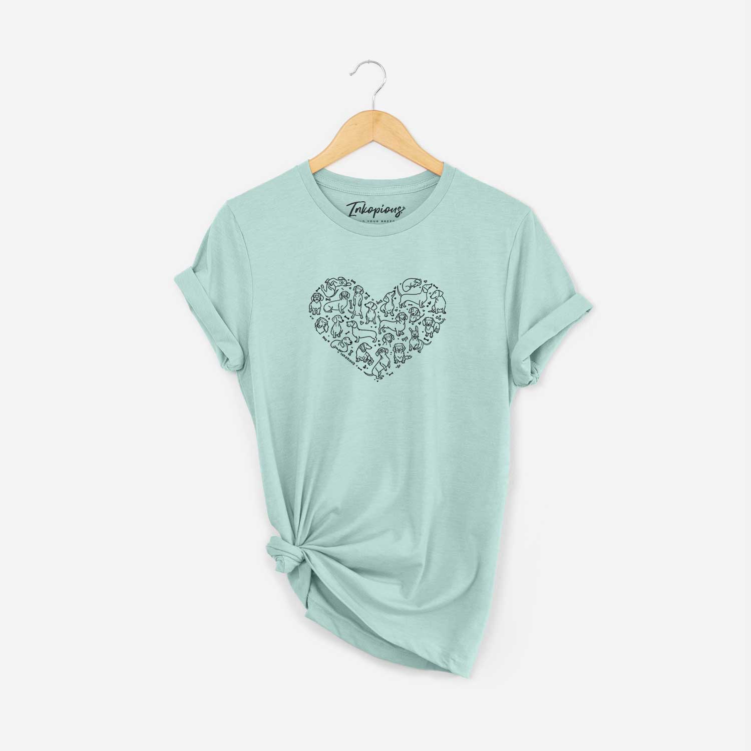 'Heart Full of Dachshunds' design on a Heather Sage Unisex crewneck