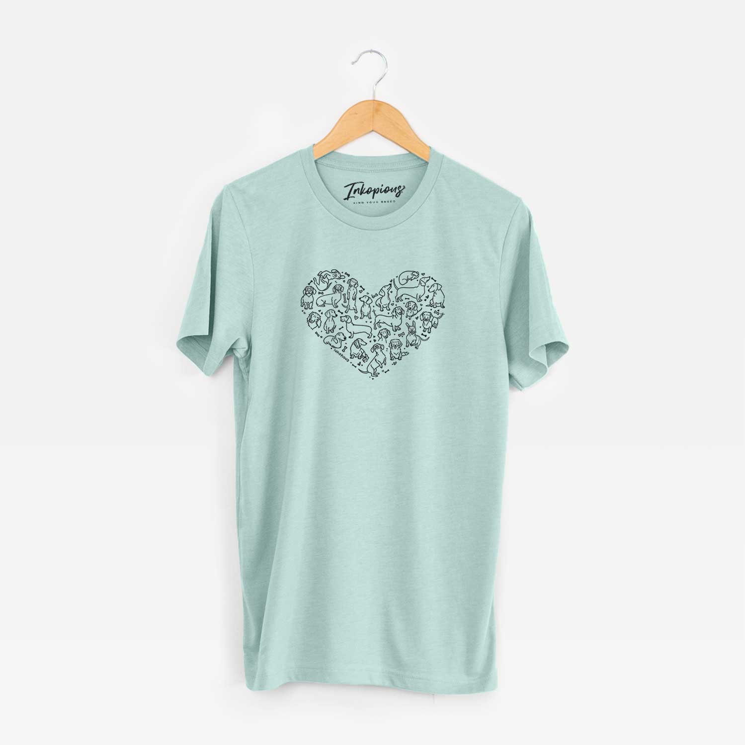 'Heart Full of Dachshunds' design on a Heather Sage Unisex crewneck