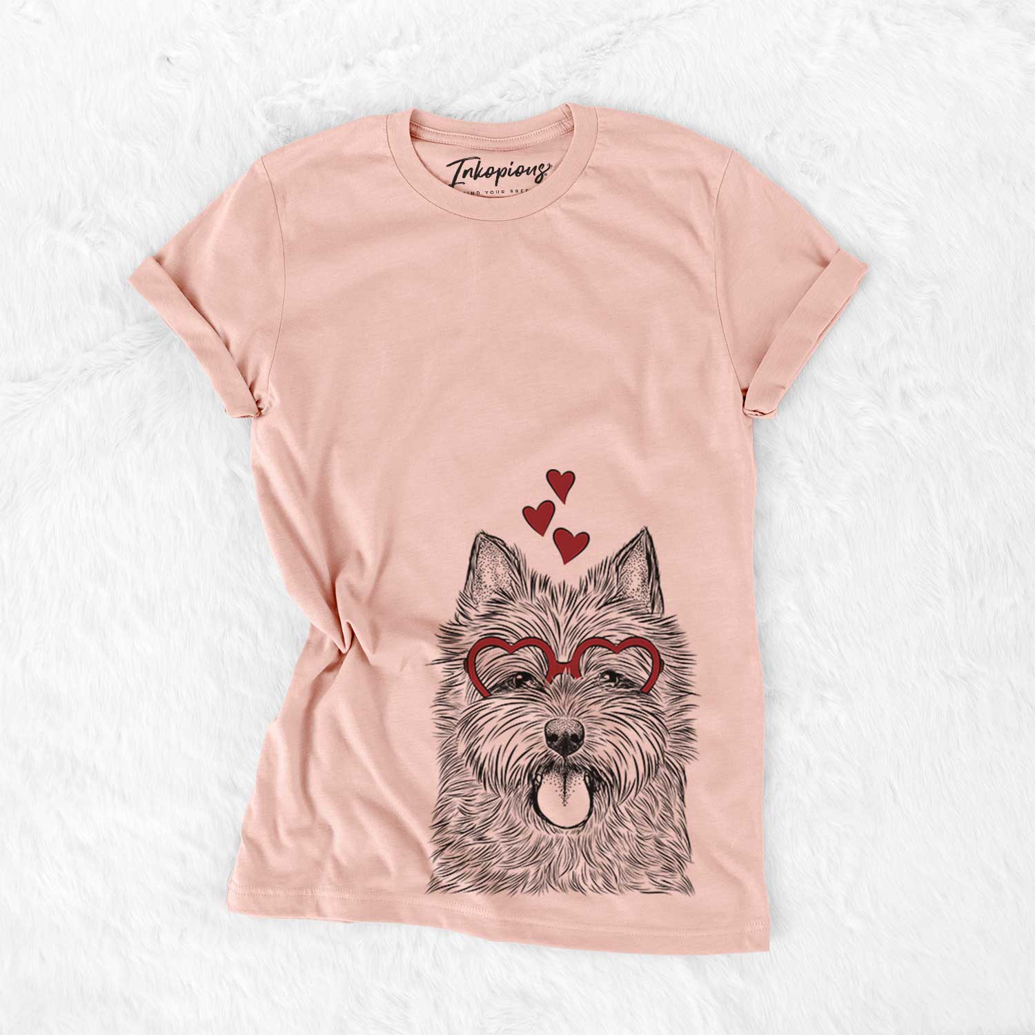 Hand-drawn sketch of Alfie the Norwich Terrier wearing heart-shaped glasses on a Peach Bella Canvas Unisex Crewneck