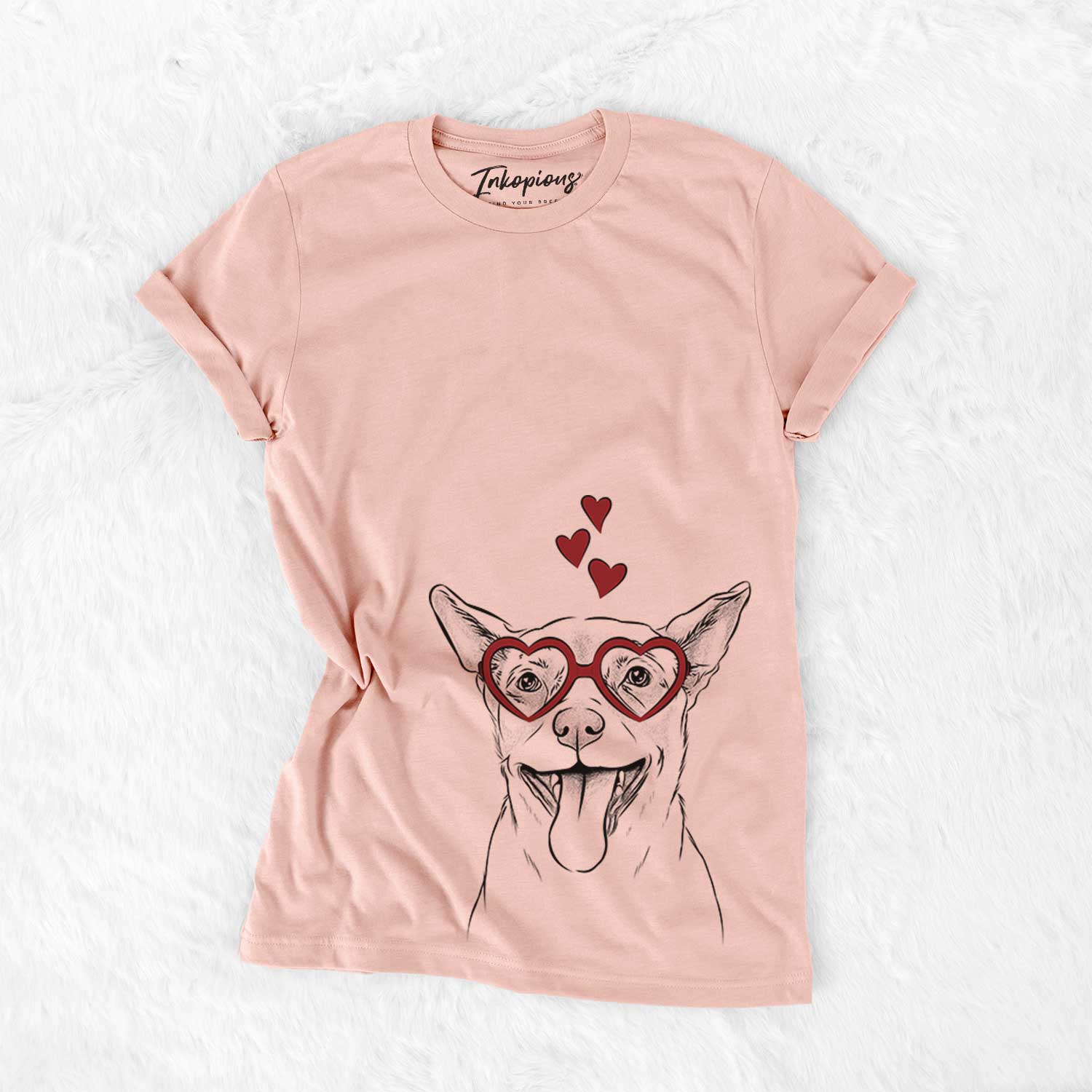 Hand-drawn sketch of Archie the Chihuahua Mix wearing heart-shaped glasses on a Peach Bella Canvas Unisex Crewneck