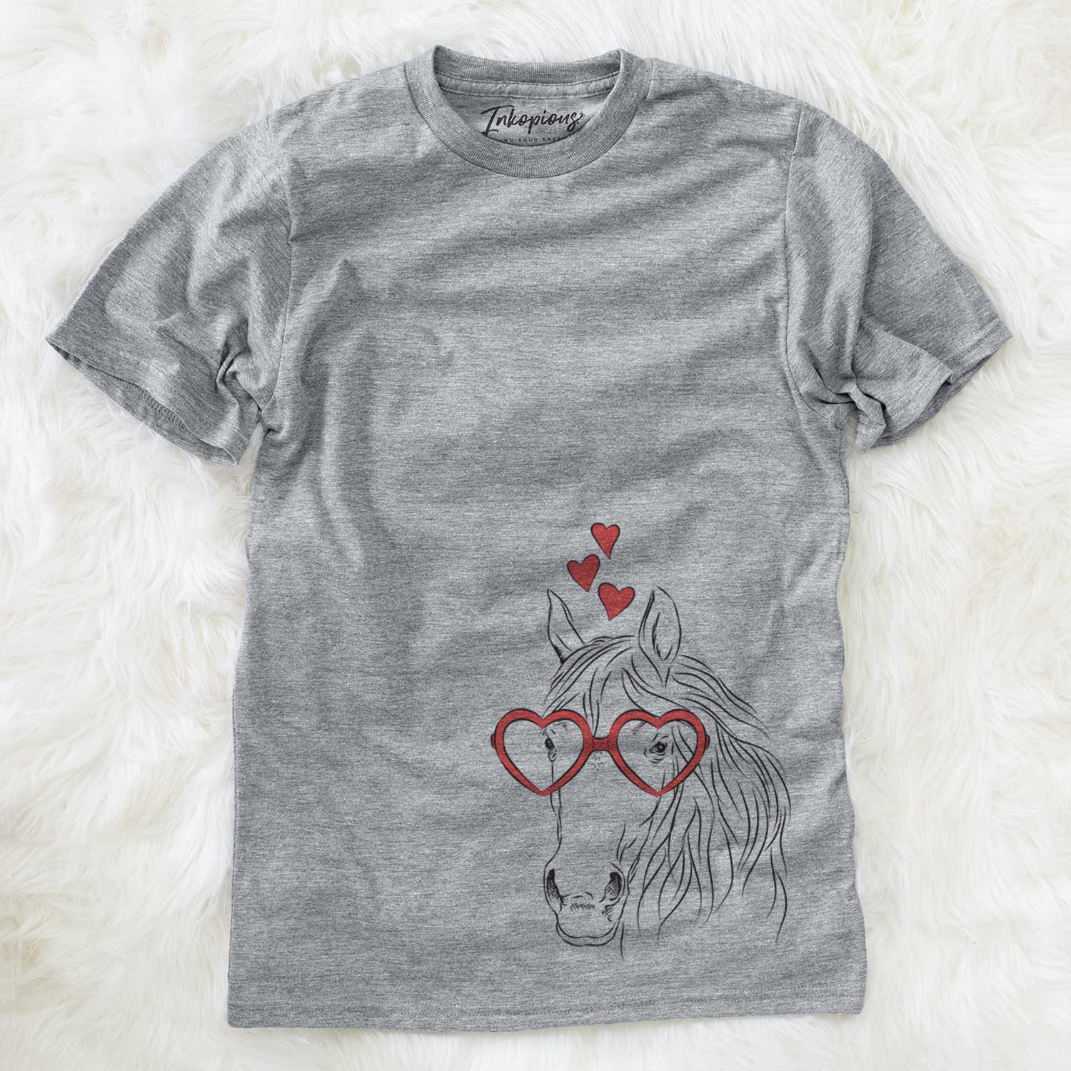 Hand-drawn sketch of Aria the Horse wearing heart-shaped glasses on a Grey Unisex crewneck