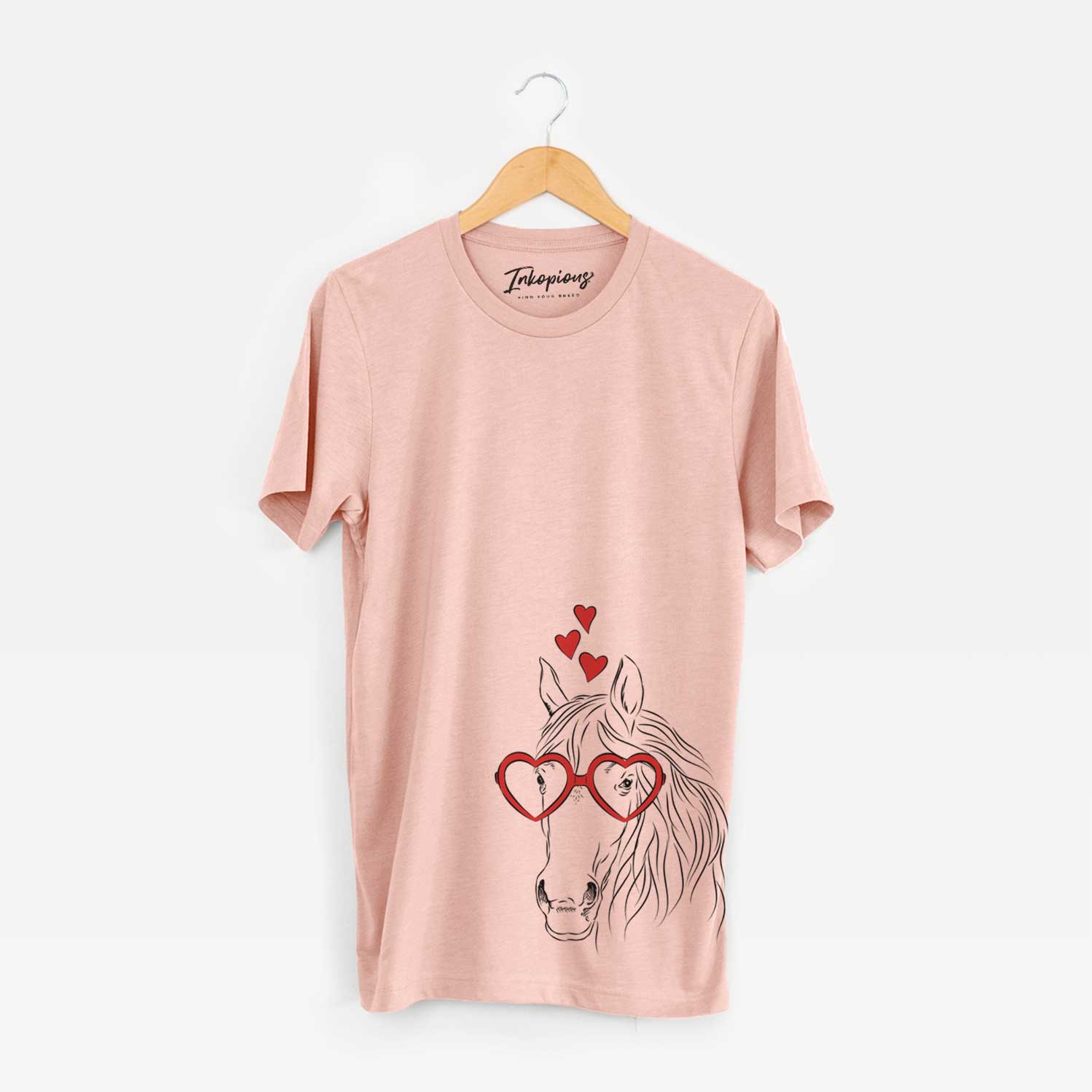 Hand-drawn sketch of Aria the Horse wearing heart-shaped glasses on a Peach Unisex crewneck