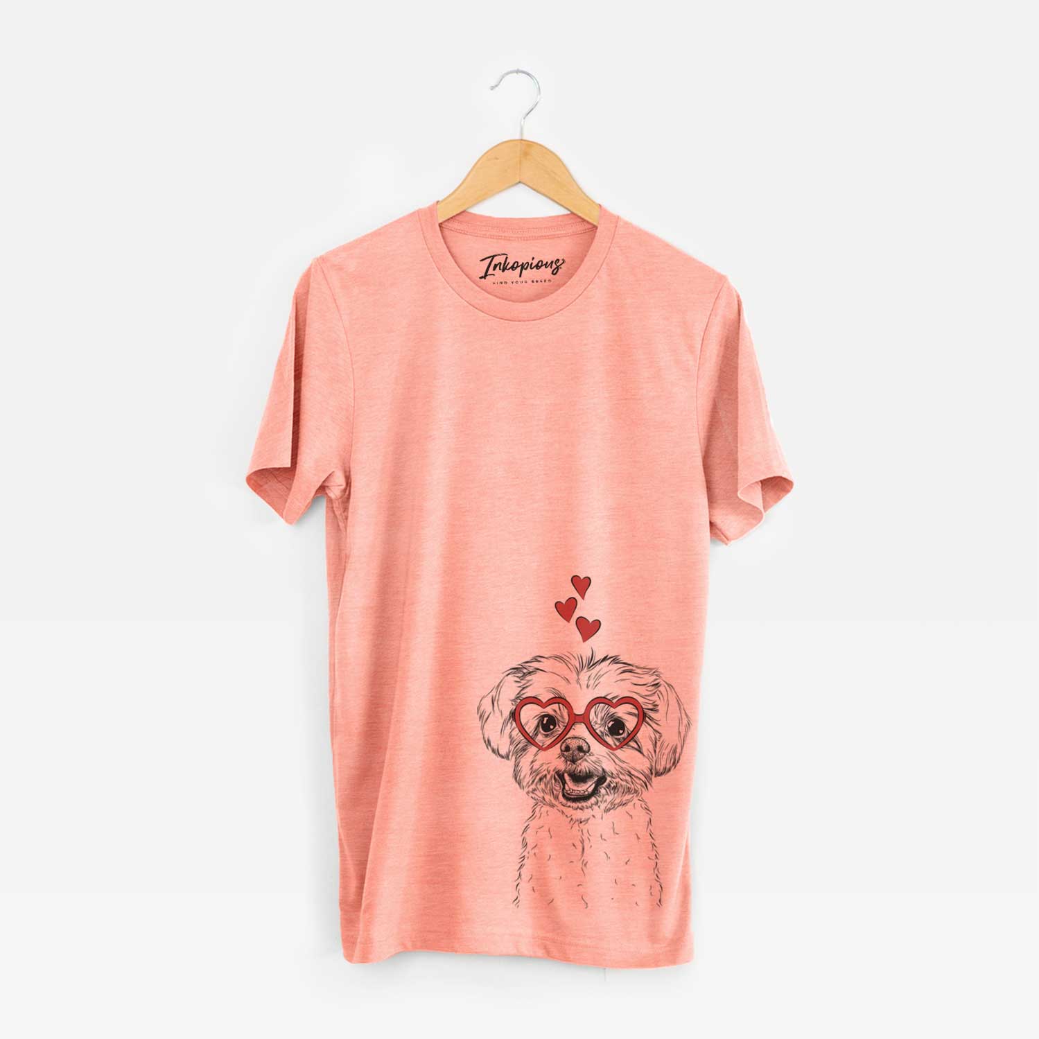 Hand-drawn sketch of Aspen the Morkie wearing heart-shaped glasses on a Sunset Unisex crewneck