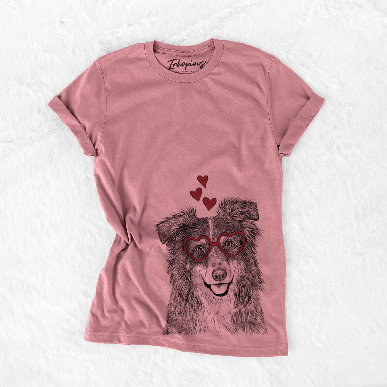 Hand-drawn sketch of Aushe the Australian Shepherd wearing heart-shaped glasses on a Mauve Bella Canvas Unisex Crewneck