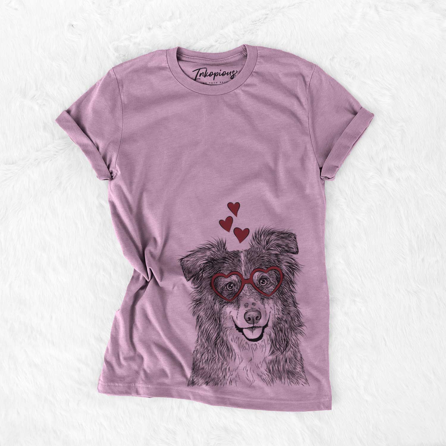 Hand-drawn sketch of Aushe the Australian Shepherd wearing heart-shaped glasses on an Orchid Bella Canvas Unisex Crewneck
