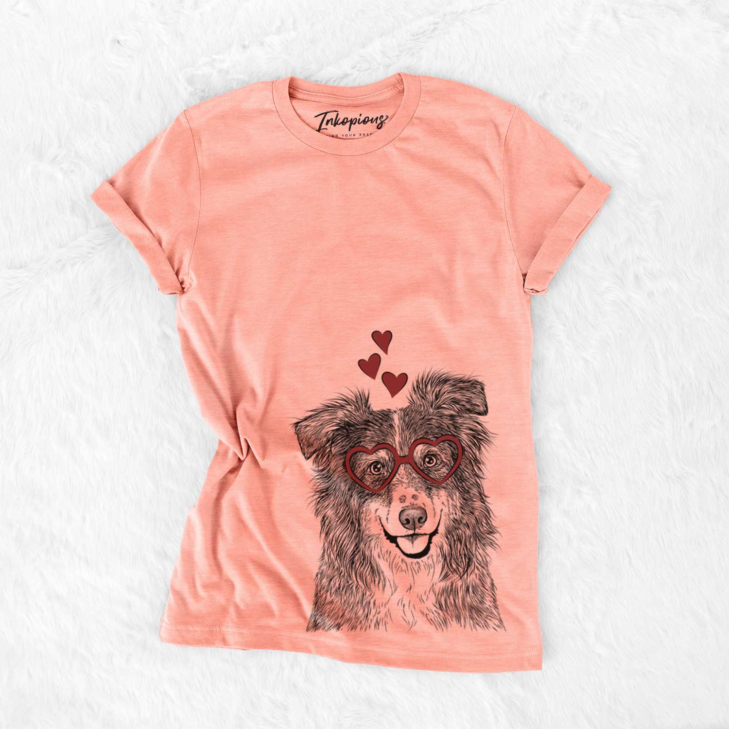 Hand-drawn sketch of Aushe the Australian Shepherd wearing heart-shaped glasses on a Sunset Bella Canvas Unisex Crewneck