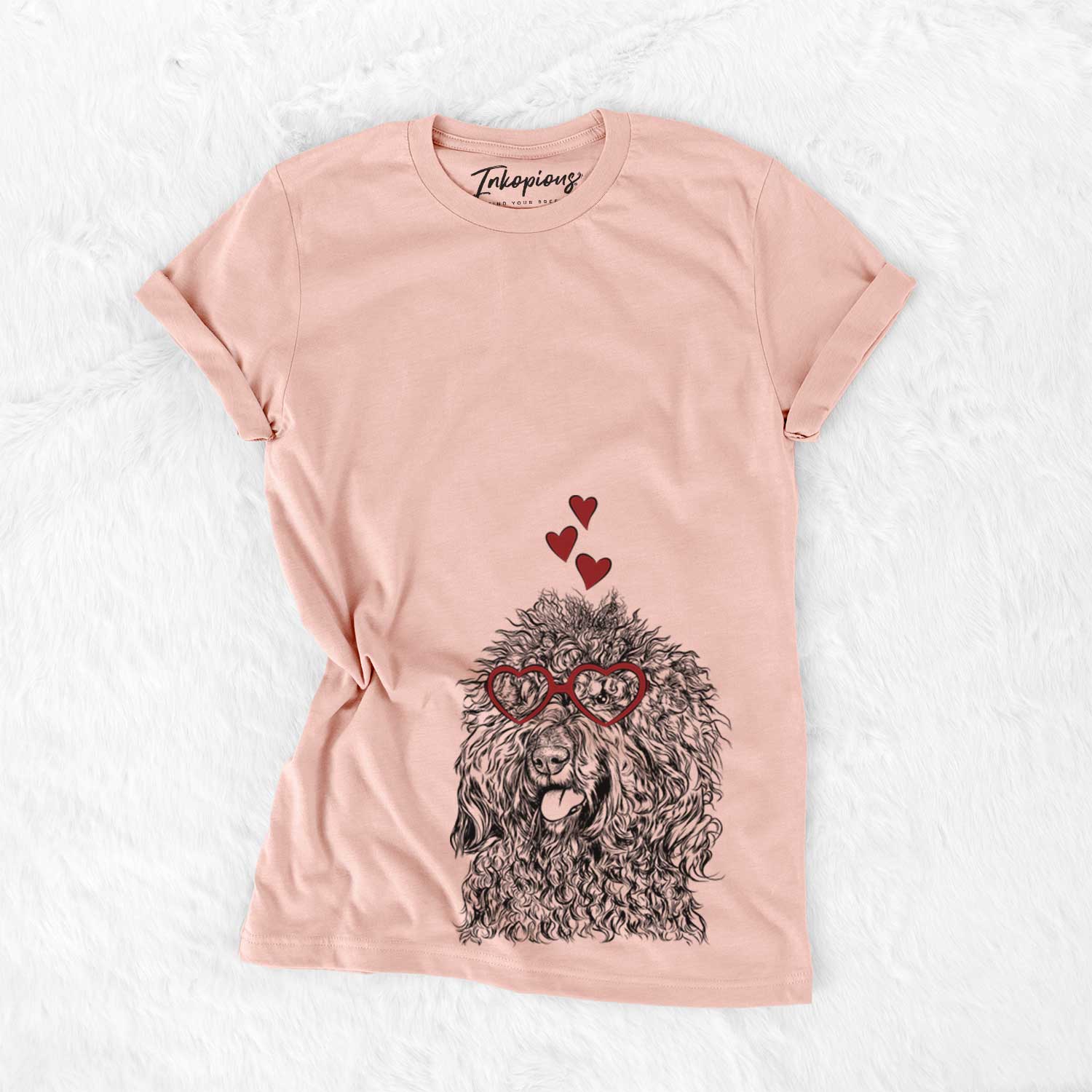 Hand-drawn sketch of Babs the Barbet wearing heart-shaped glasses on a Peach Bella Canvas Unisex Crewneck