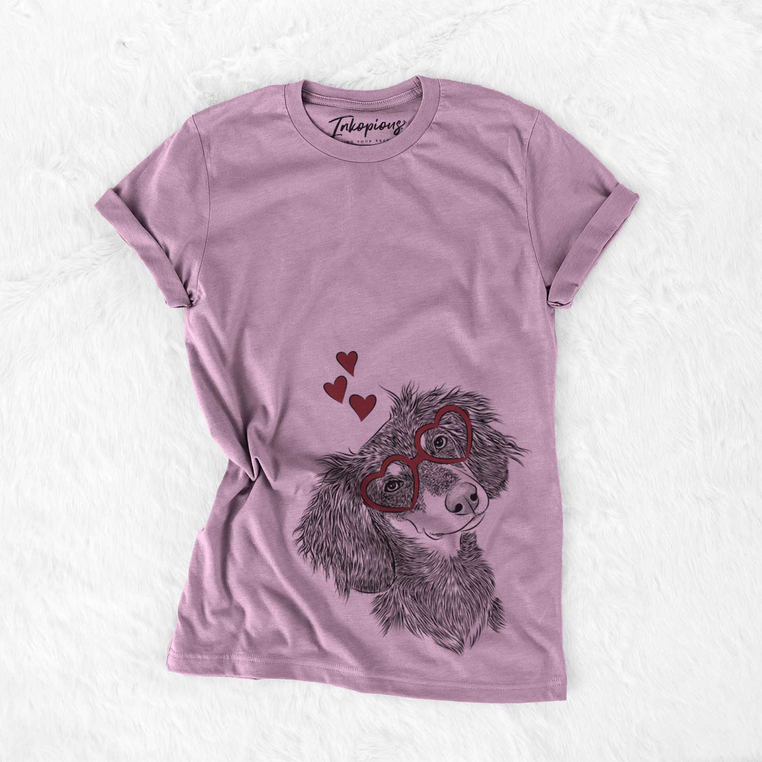 Hand-drawn sketch of Bailey the Long Haired Dachshund wearing heart-shaped glasses on an Orchid Bella Canvas Unisex Crewneck