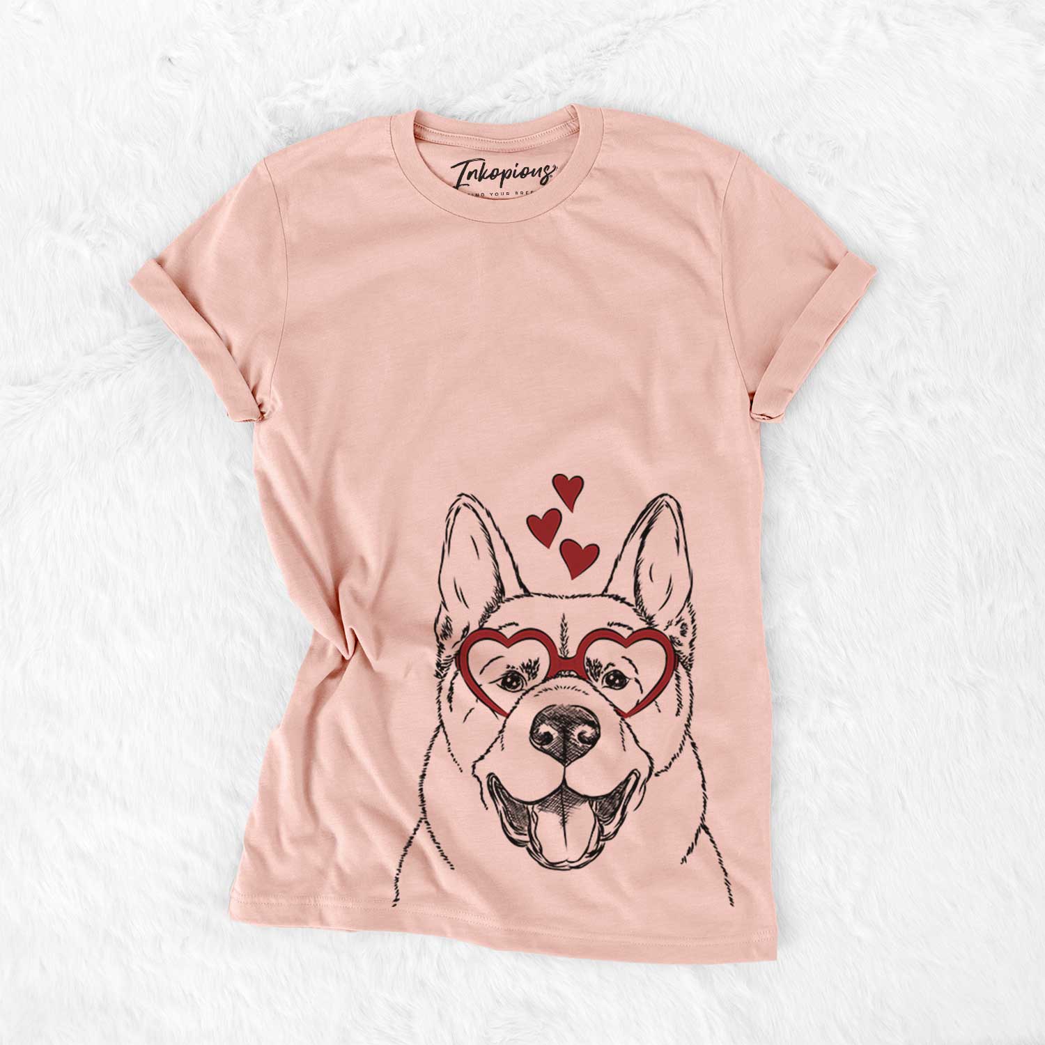Hand-drawn sketch of Baku the Akita wearing heart-shaped glasses on a Peach Bella Canvas Unisex Crewneck