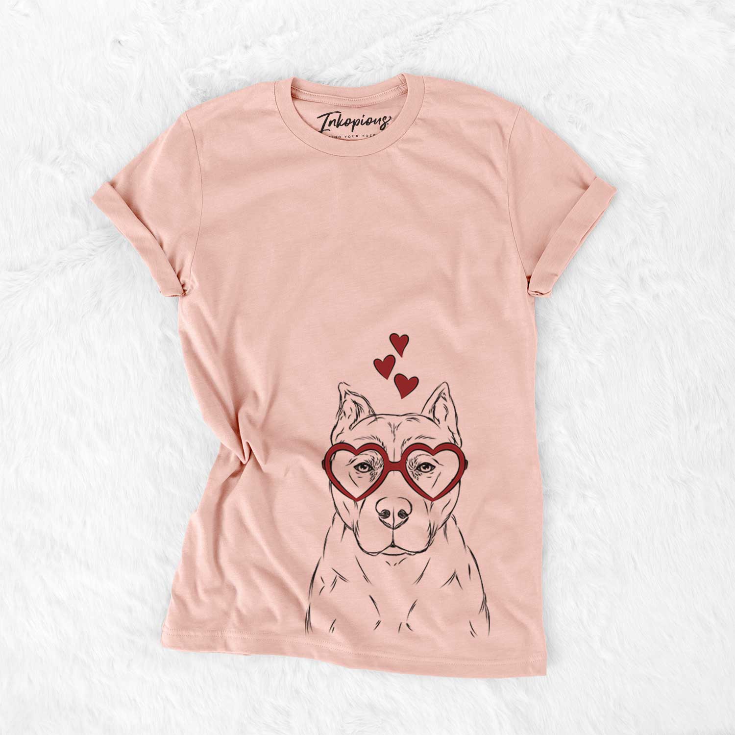 Hand-drawn sketch of Bane the Pitbull Mix wearing heart-shaped glasses on a Peach Bella Canvas Unisex Crewneck