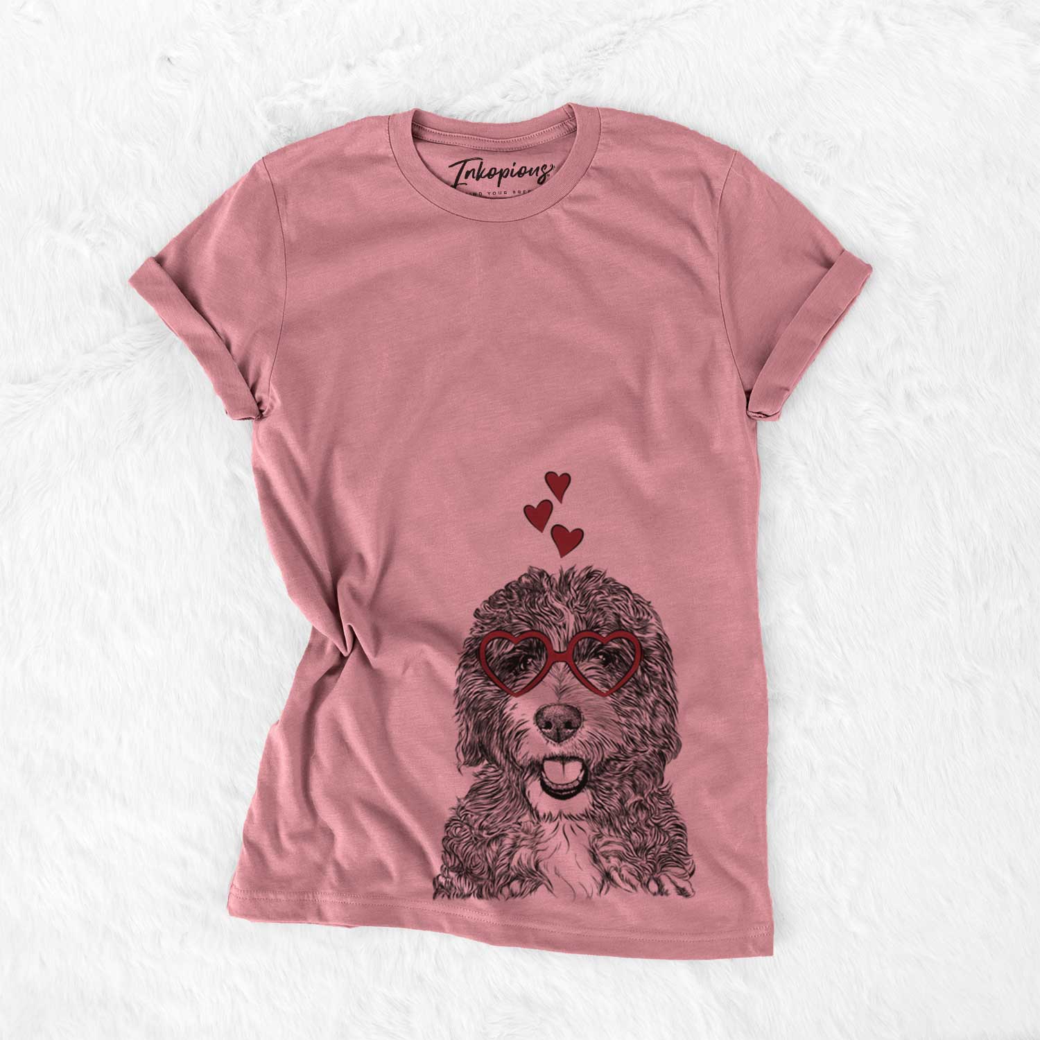 Hand-drawn sketch of Bash the Bernedoodle wearing heart-shaped glasses on a Mauve Bella Canvas Unisex Crewneck