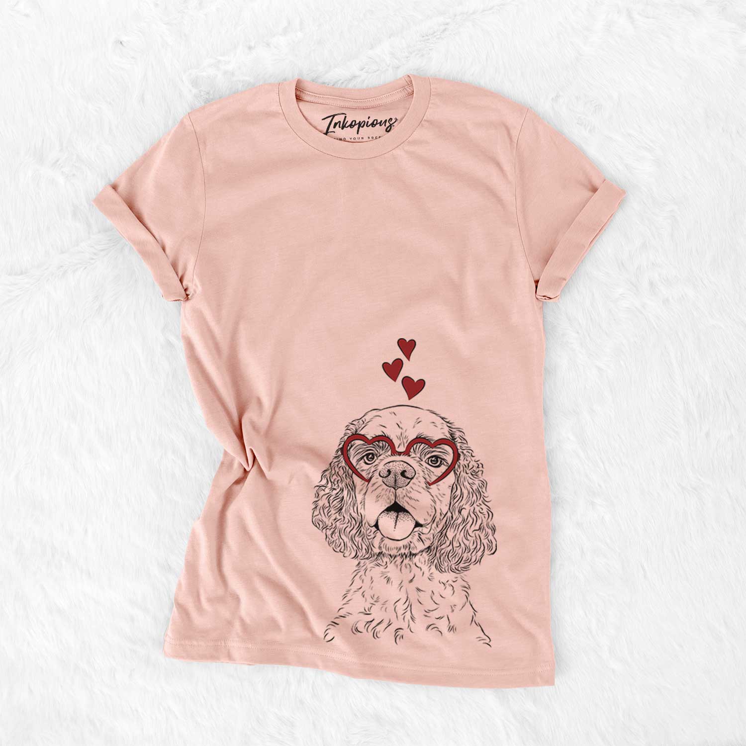 Hand-drawn sketch of Baxter the American Cocker Spaniel wearing heart-shaped glasses on a Peach Bella Canvas Unisex Crewneck