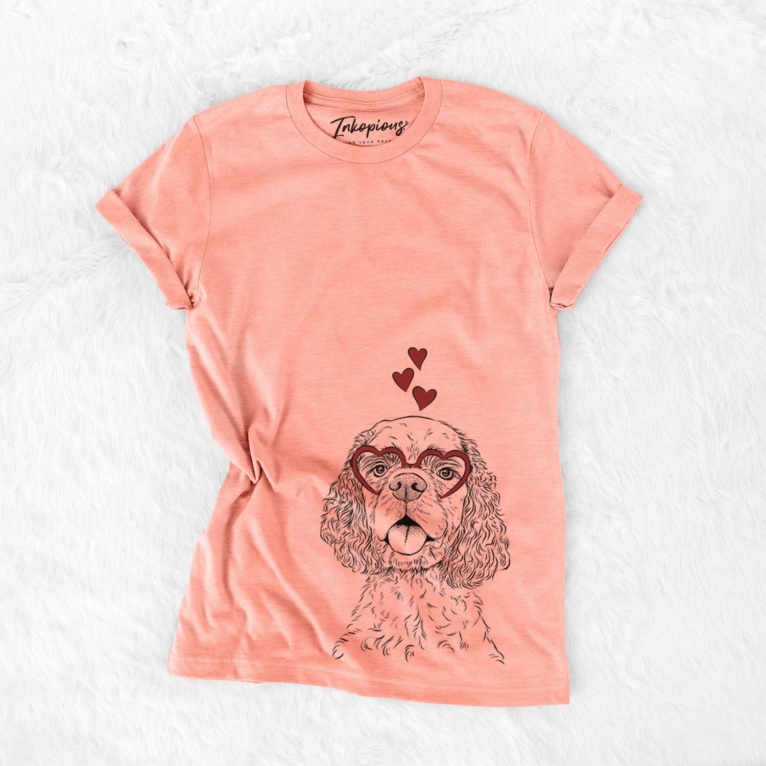 Hand-drawn sketch of Baxter the American Cocker Spaniel wearing heart-shaped glasses on a Sunset Bella Canvas Unisex Crewneck
