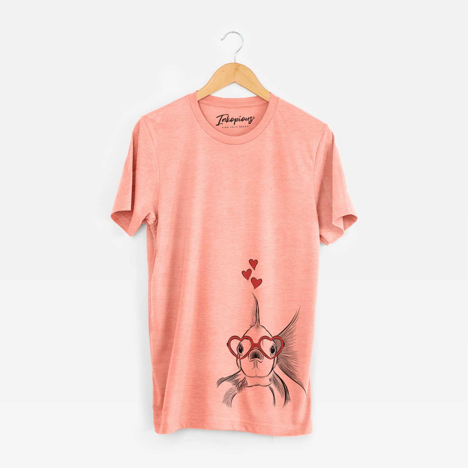Hand-drawn sketch of Beefcake the Goldfish wearing heart-shaped glasses on a Sunset Unisex crewneck