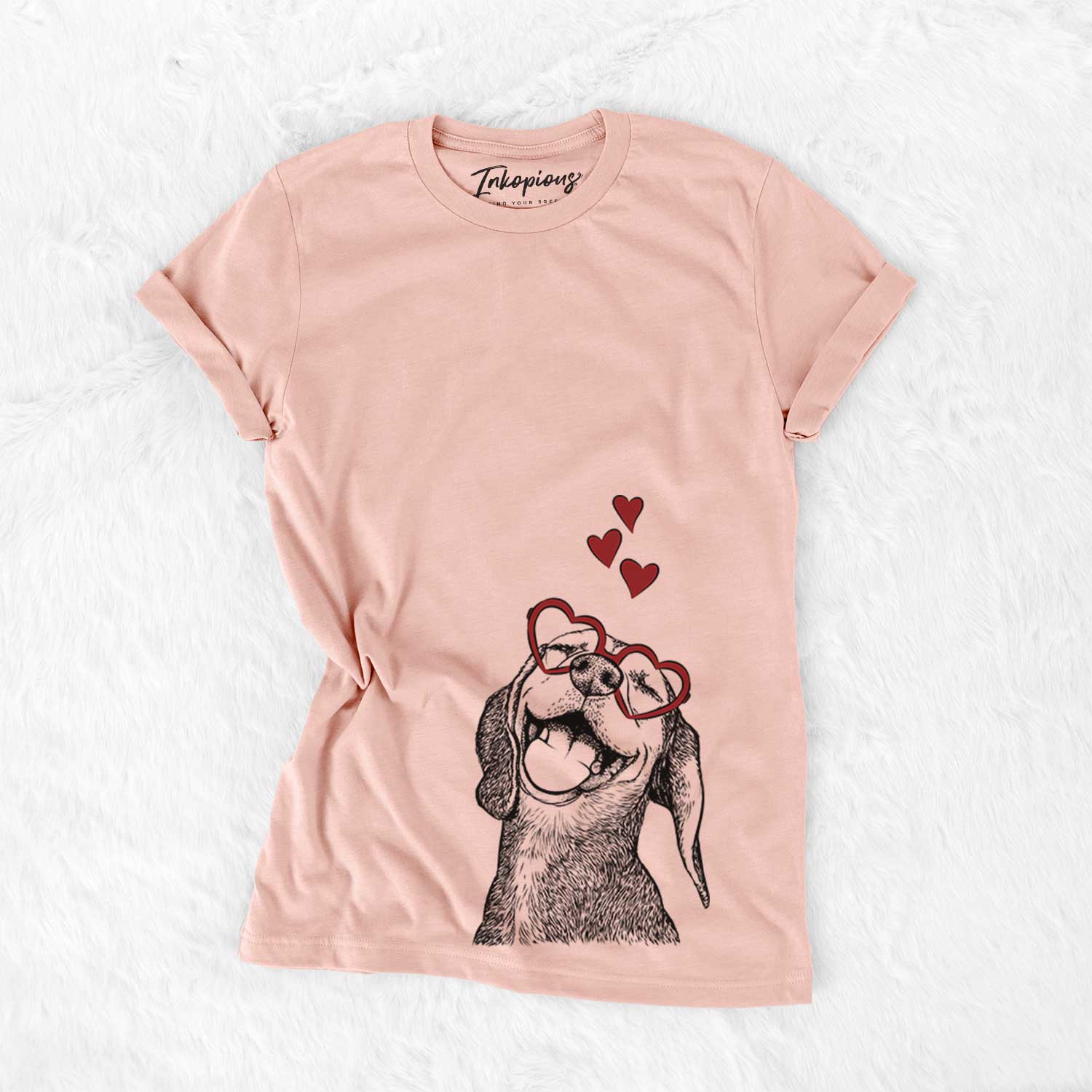 Hand-drawn sketch of Belle the Hound Mix wearing heart-shaped glasses on a Peach Bella Canvas Unisex Crewneck