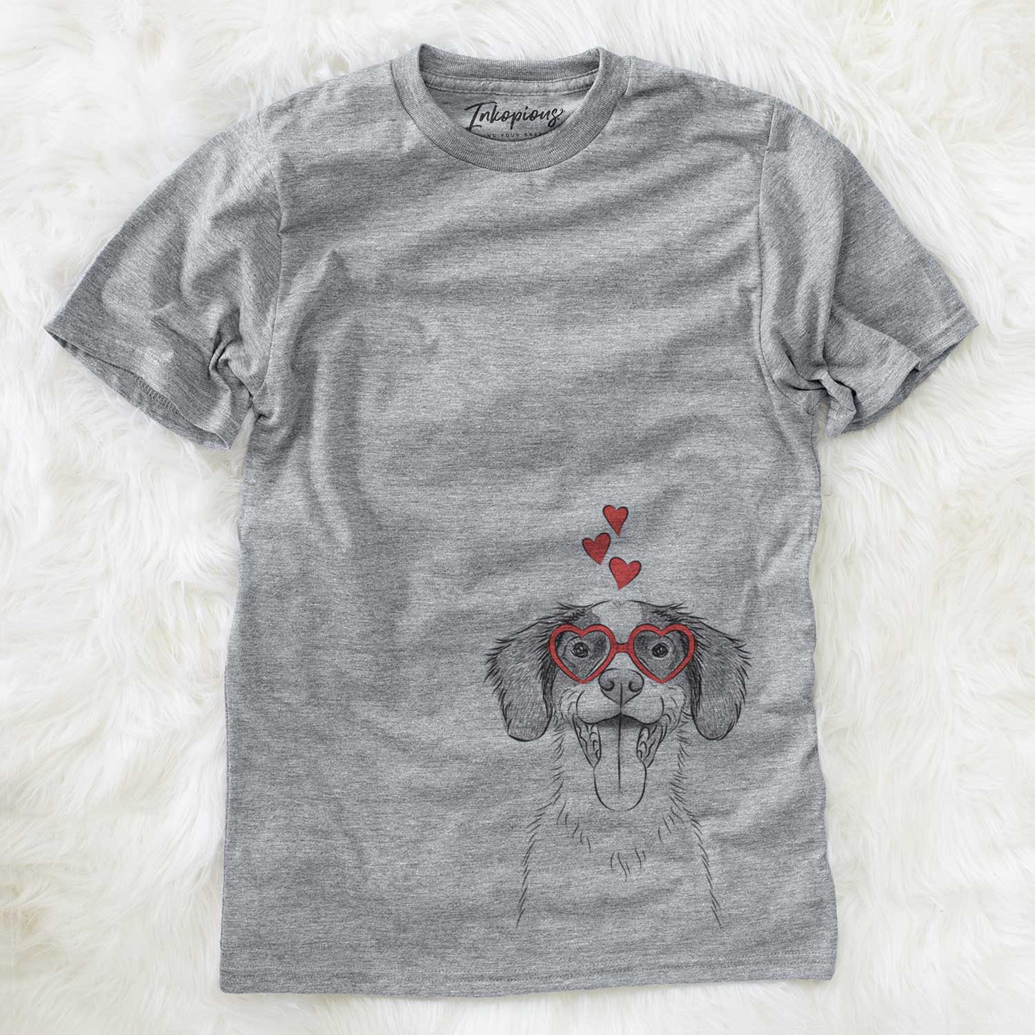 Hand-drawn sketch of Birdie the Brittany wearing heart-shaped glasses on a Grey Unisex crewneck