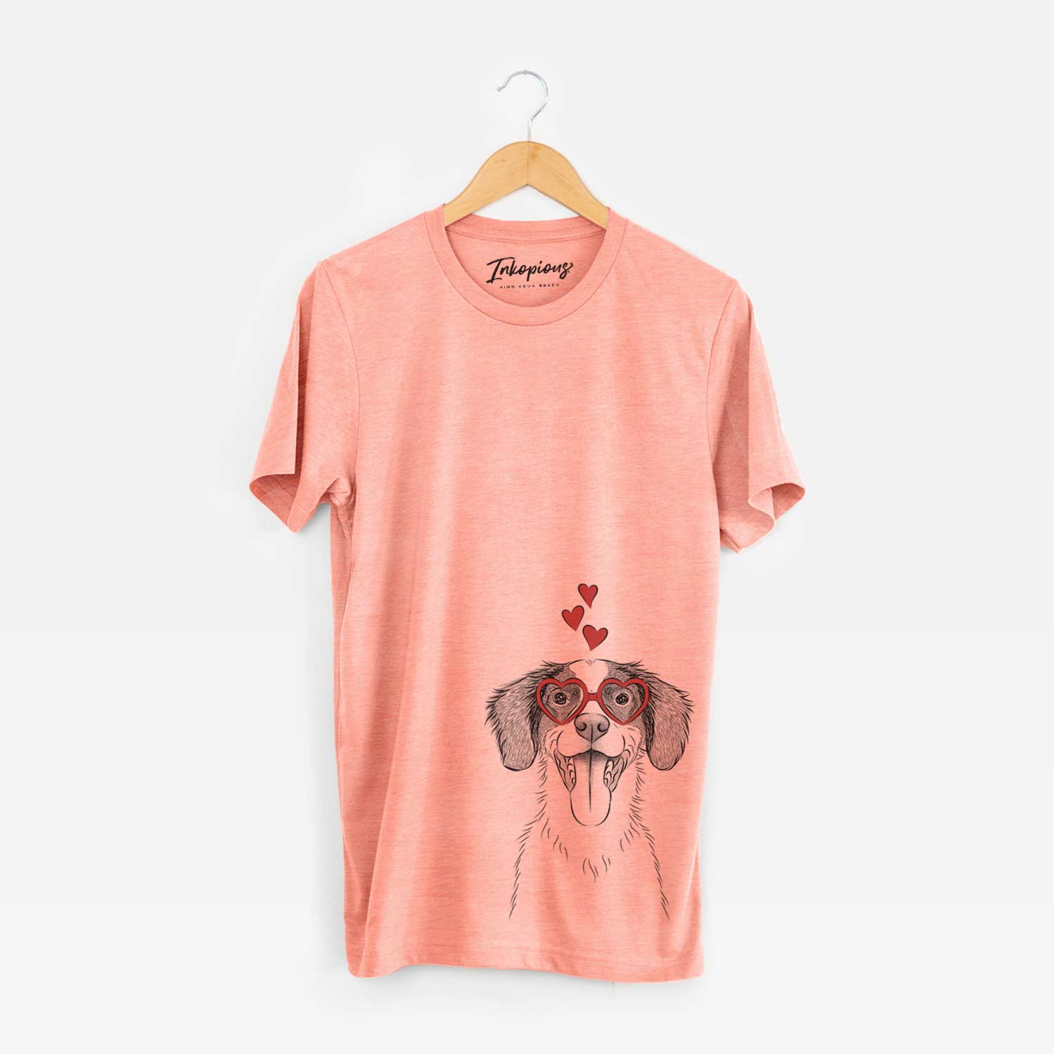 Hand-drawn sketch of Birdie the Brittany wearing heart-shaped glasses on a Sunset Unisex crewneck