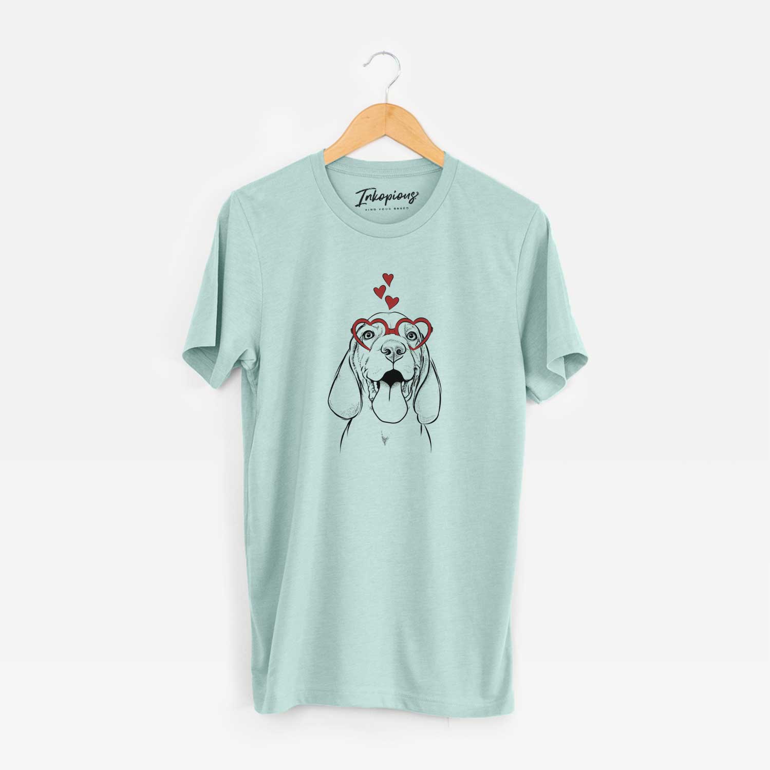 Hand-drawn sketch of Bodi the Vizsla wearing heart-shaped glasses on a Heather Sage Unisex crewneck