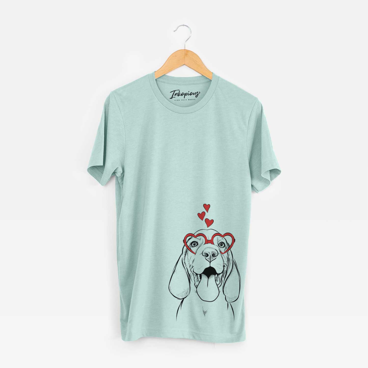 Hand-drawn sketch of Bodi the Vizsla wearing heart-shaped glasses on a Heather Sage Unisex crewneck