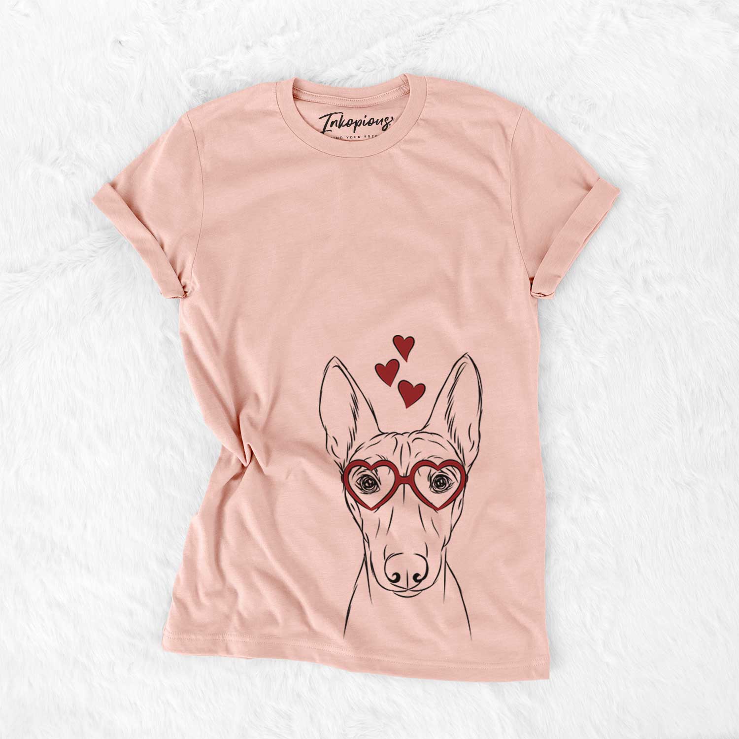 Hand-drawn sketch of Bonsai the Basenji wearing heart-shaped glasses on a Peach Bella Canvas Unisex Crewneck