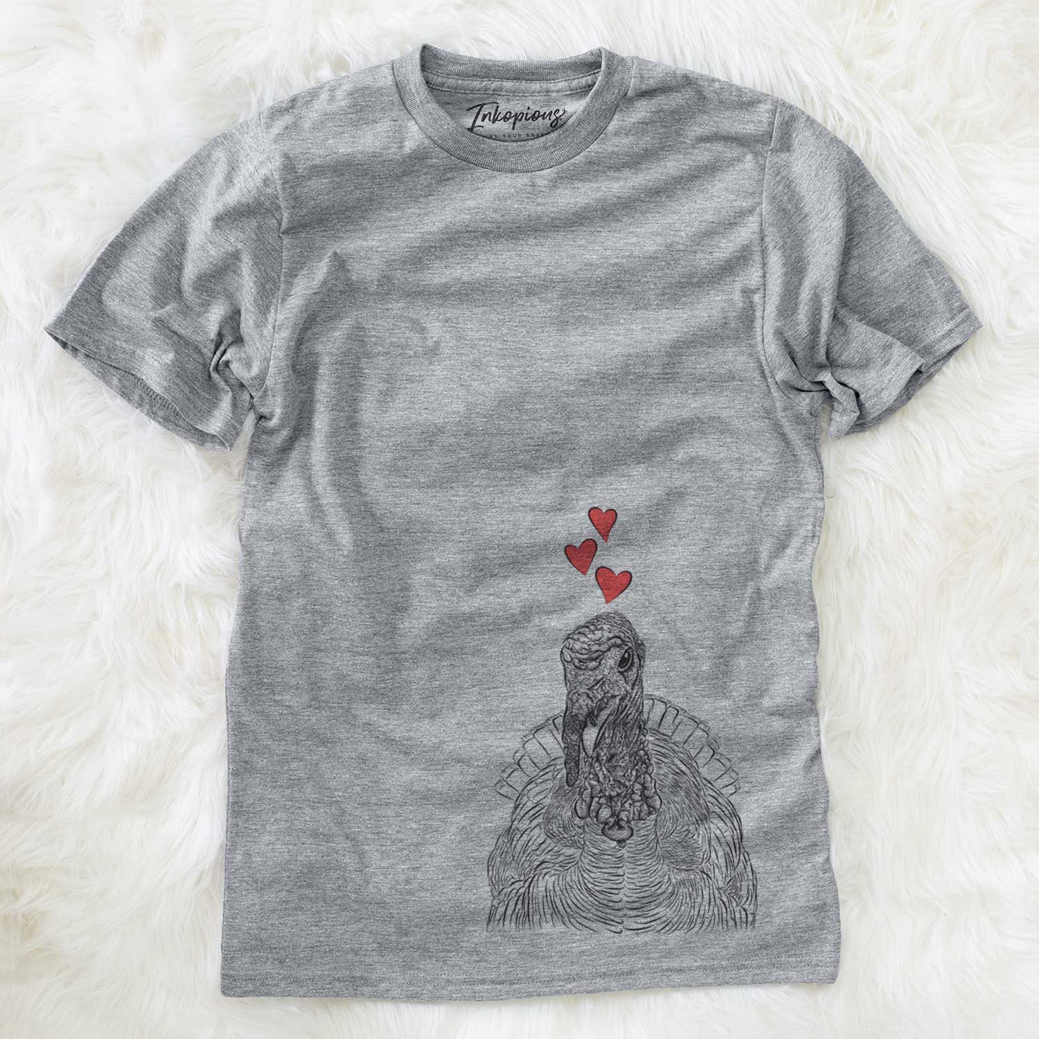 Hand-drawn sketch of Brady the Turkey wearing heart-shaped glasses on a Grey Unisex crewneck