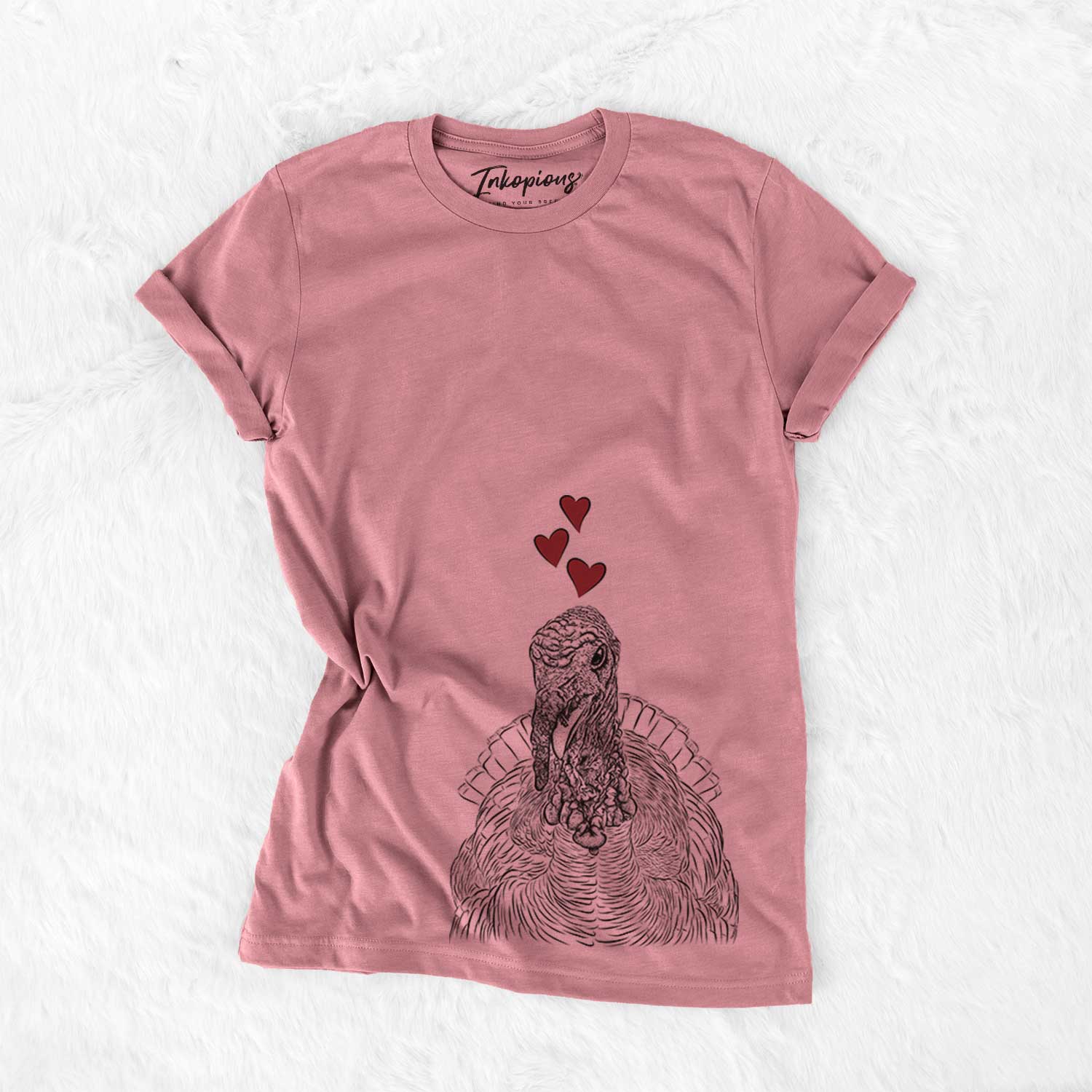 Hand-drawn sketch of Brady the Turkey wearing heart-shaped glasses on a Mauve Bella Canvas Unisex Crewneck