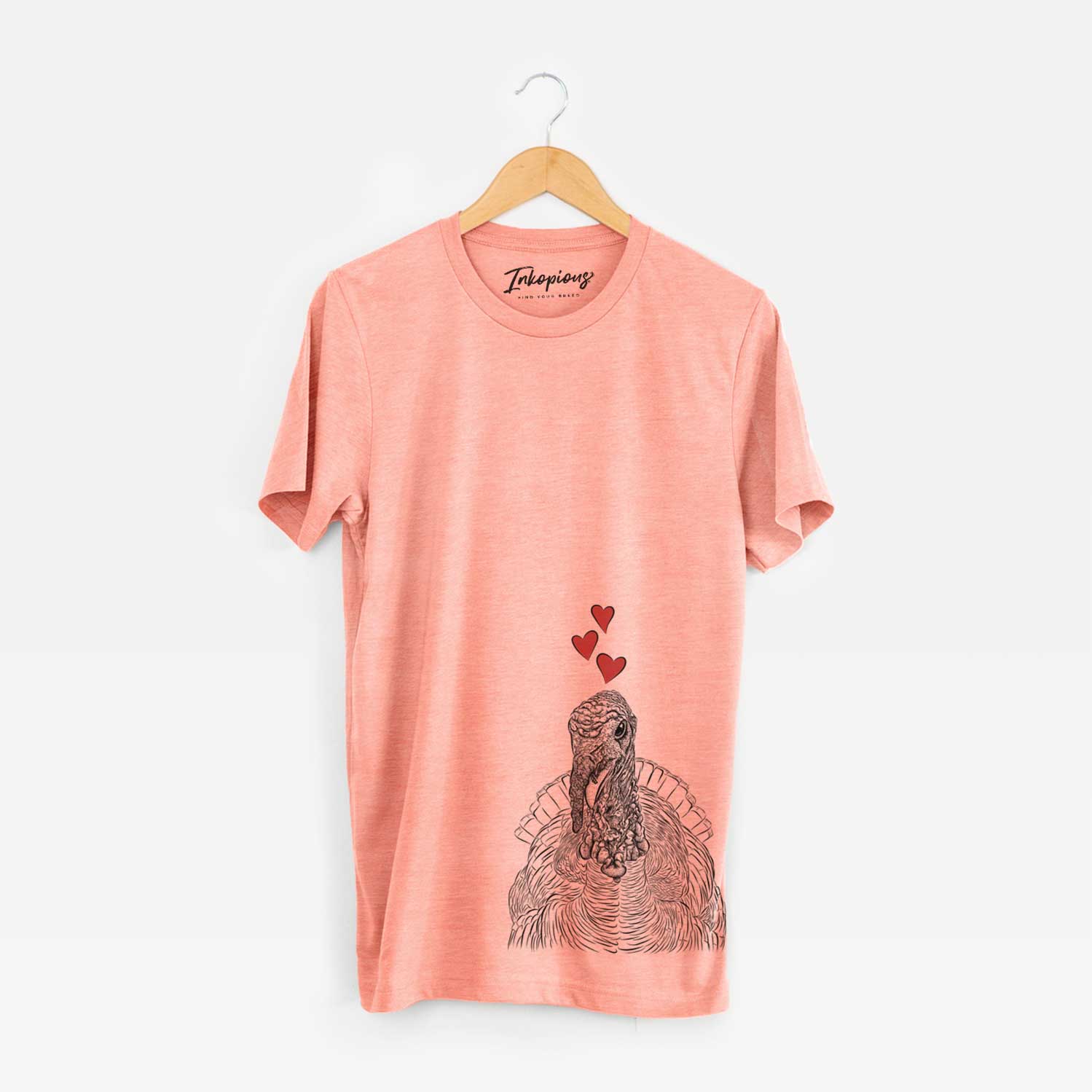 Hand-drawn sketch of Brady the Turkey wearing heart-shaped glasses on a Sunset Unisex crewneck
