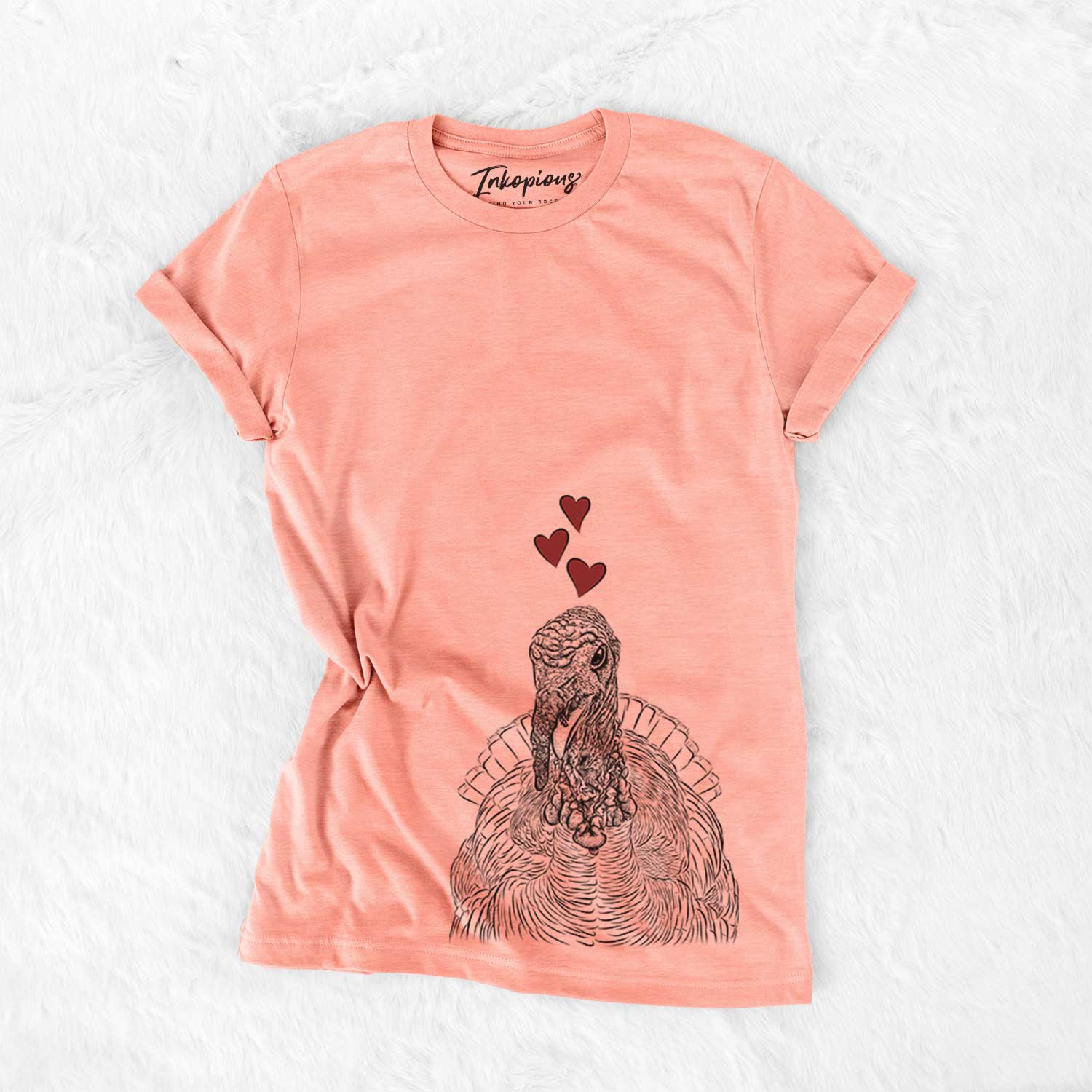 Hand-drawn sketch of Brady the Turkey wearing heart-shaped glasses on a Sunset Bella Canvas Unisex Crewneck