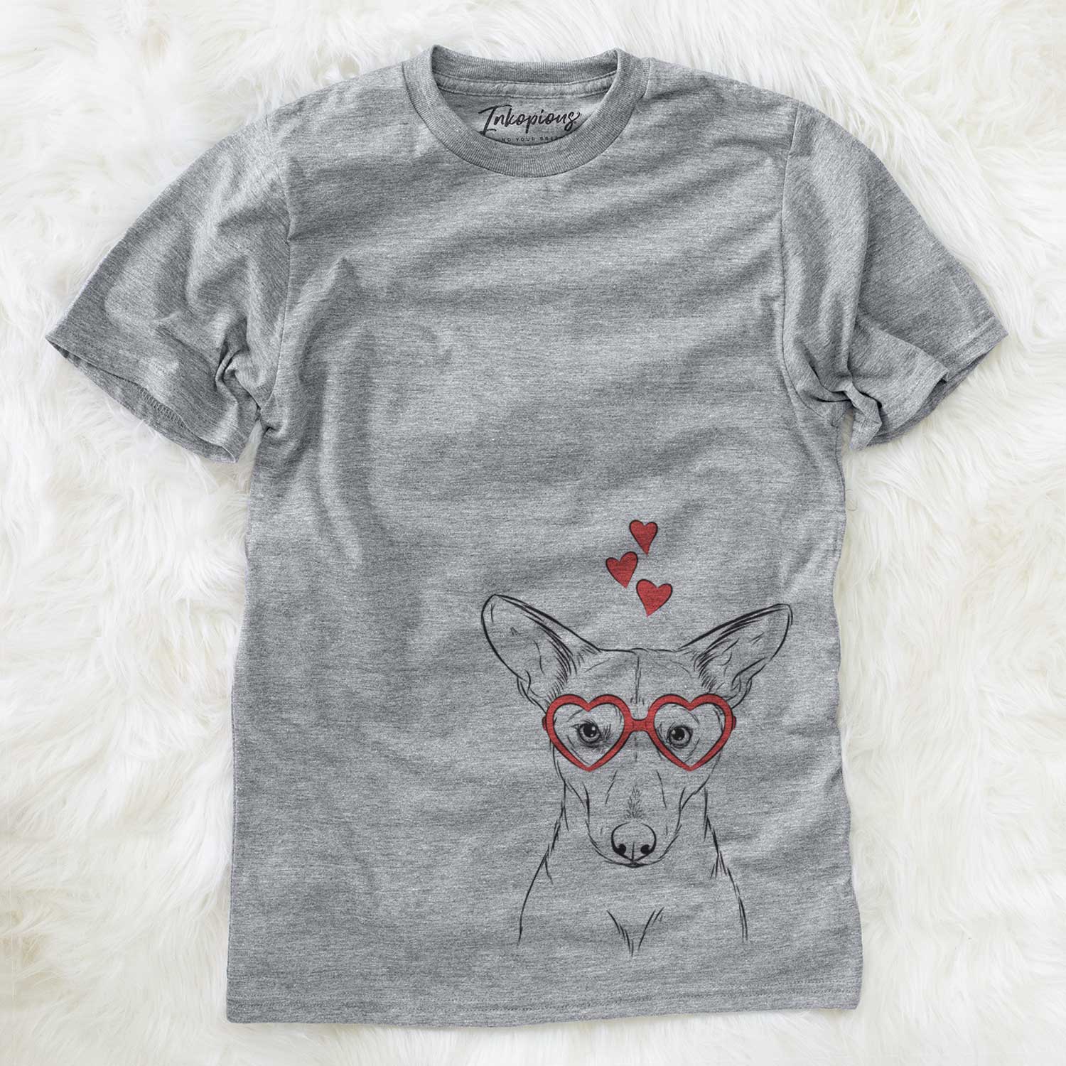 Hand-drawn sketch of Buff the Dorgi wearing heart-shaped glasses on a Grey Unisex crewneck