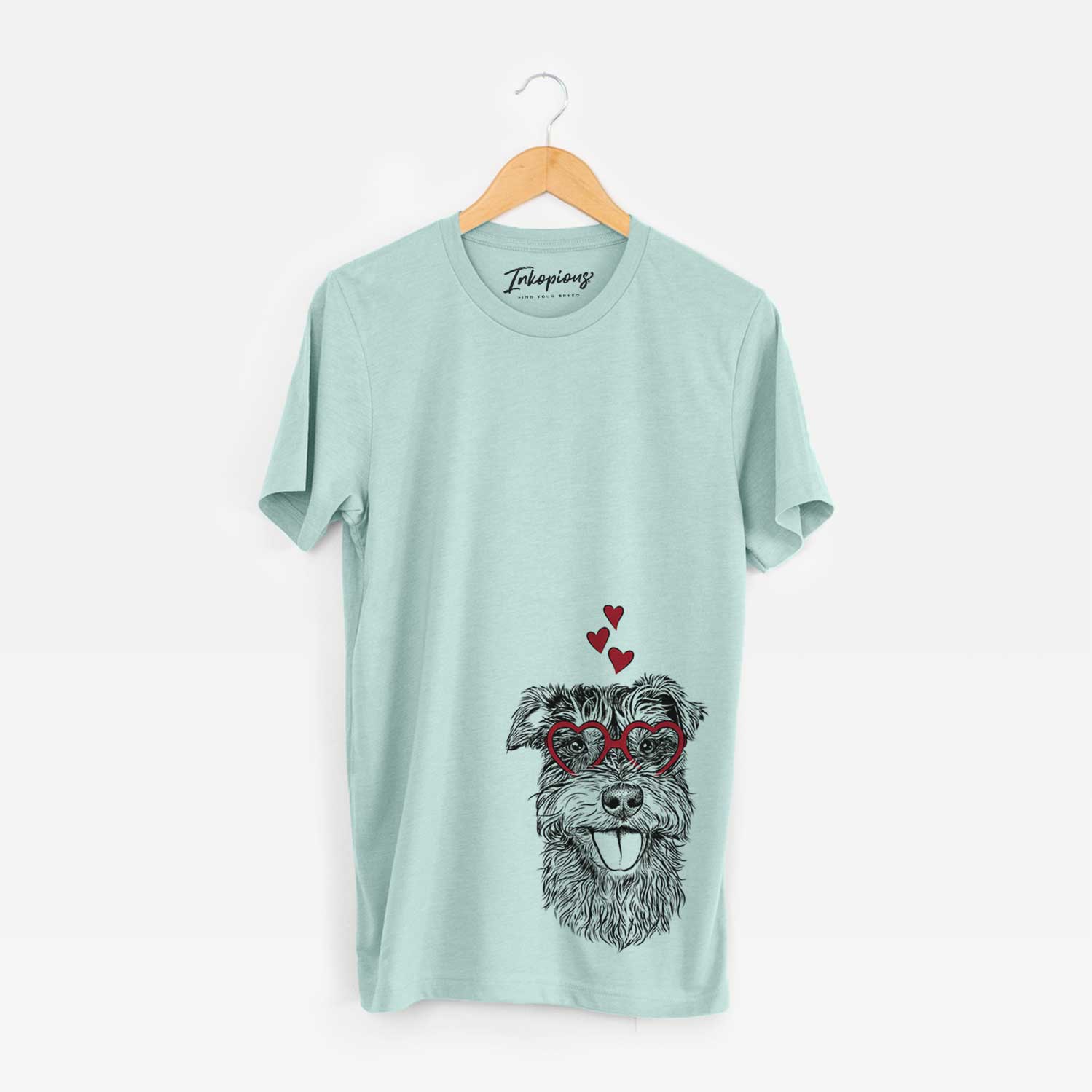 Hand-drawn sketch of Buster the Schnoodle wearing heart-shaped glasses on a Heather Sage Bella Canvas Unisex Crewneck