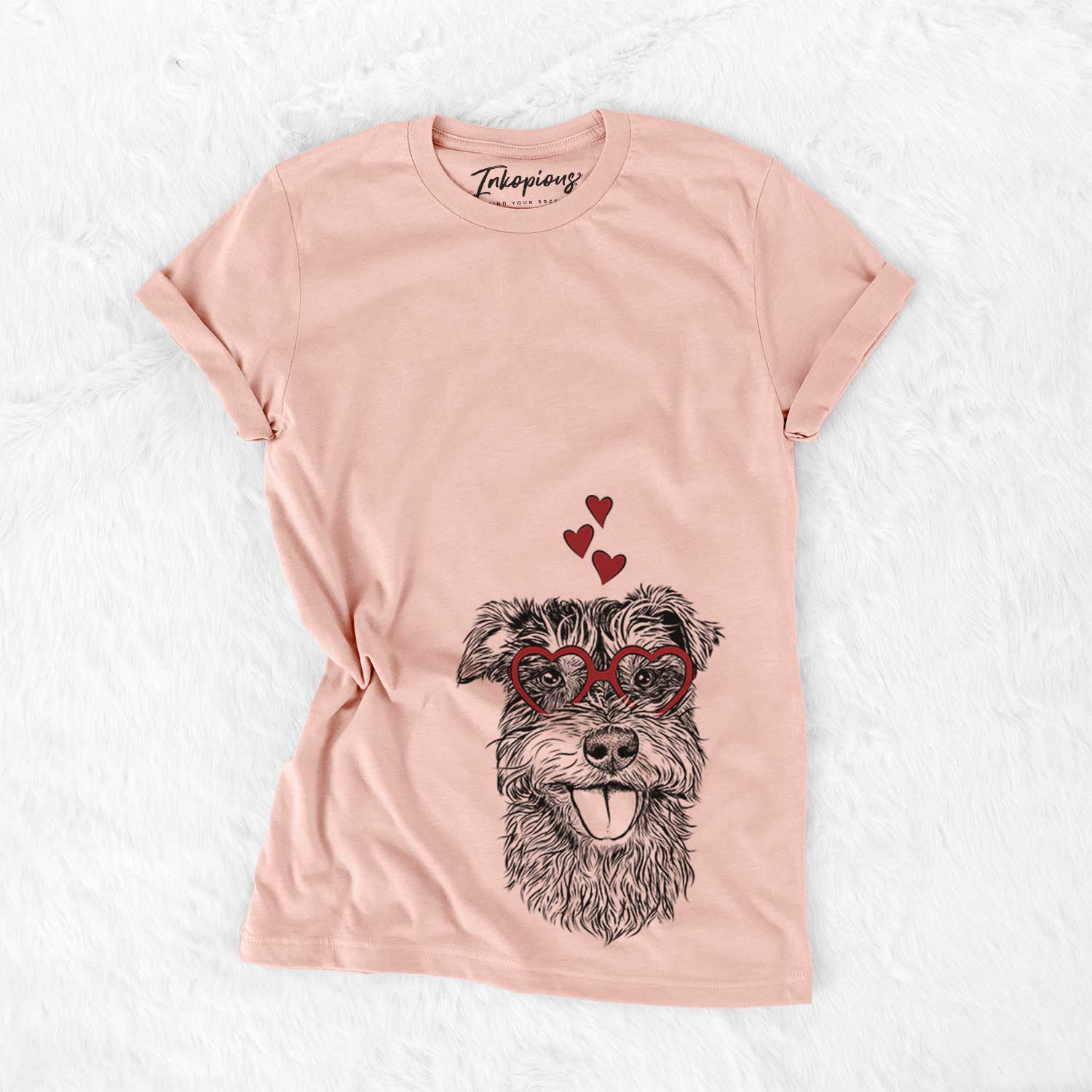 Hand-drawn sketch of Buster the Schnoodle wearing heart-shaped glasses on a Peach Bella Canvas Unisex Crewneck